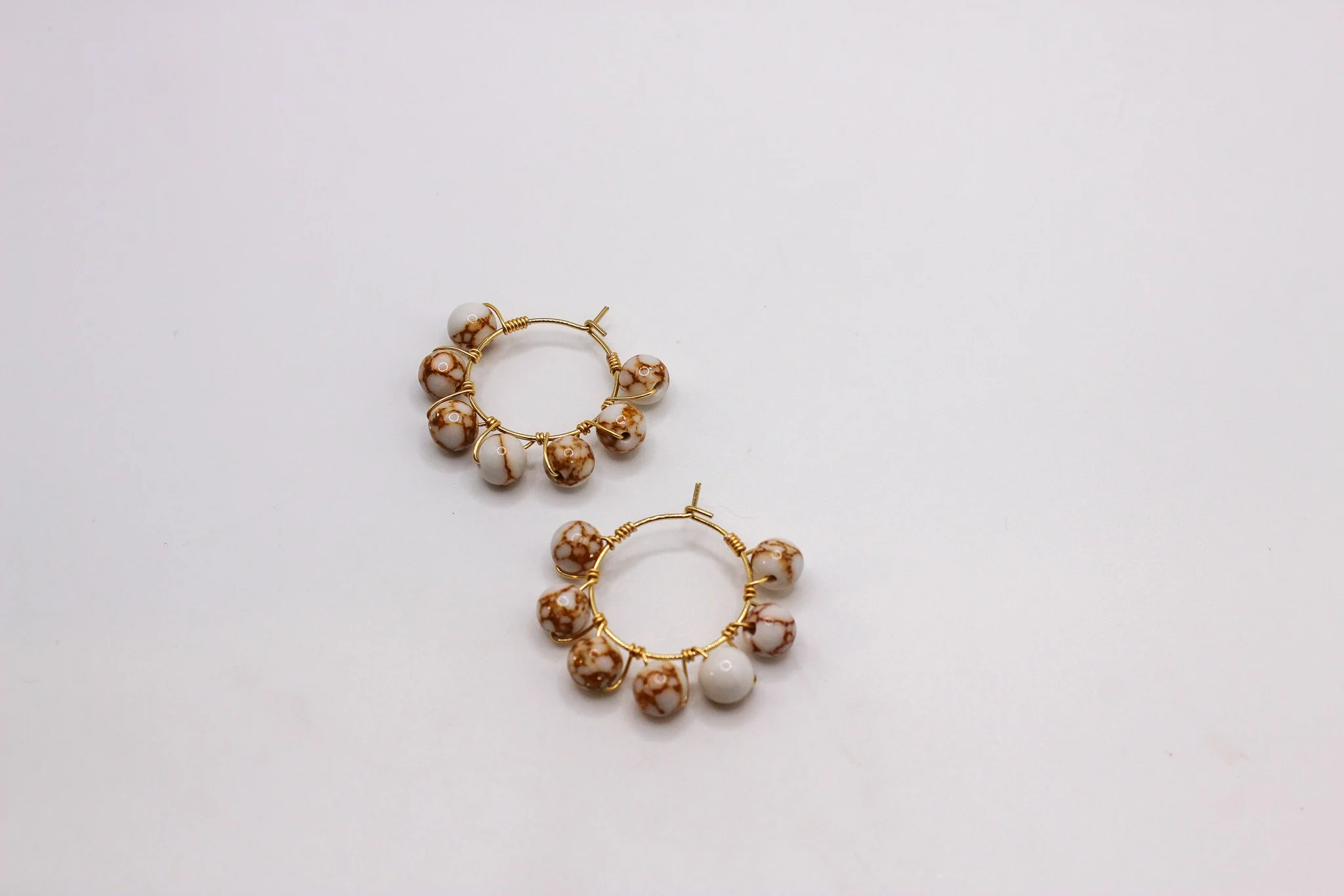 White and brown crackle hoops