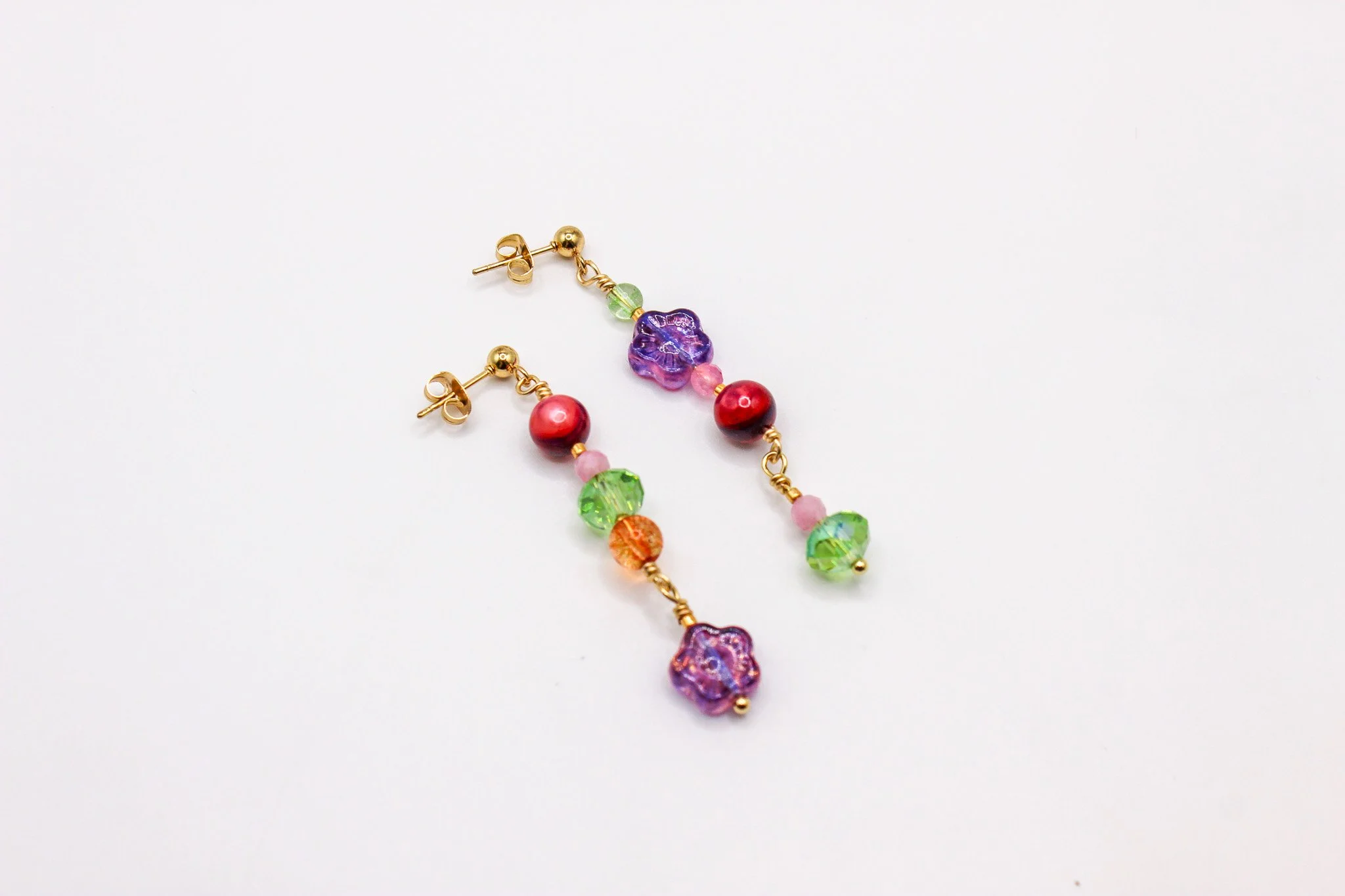 Pink flower with green, orange and pink