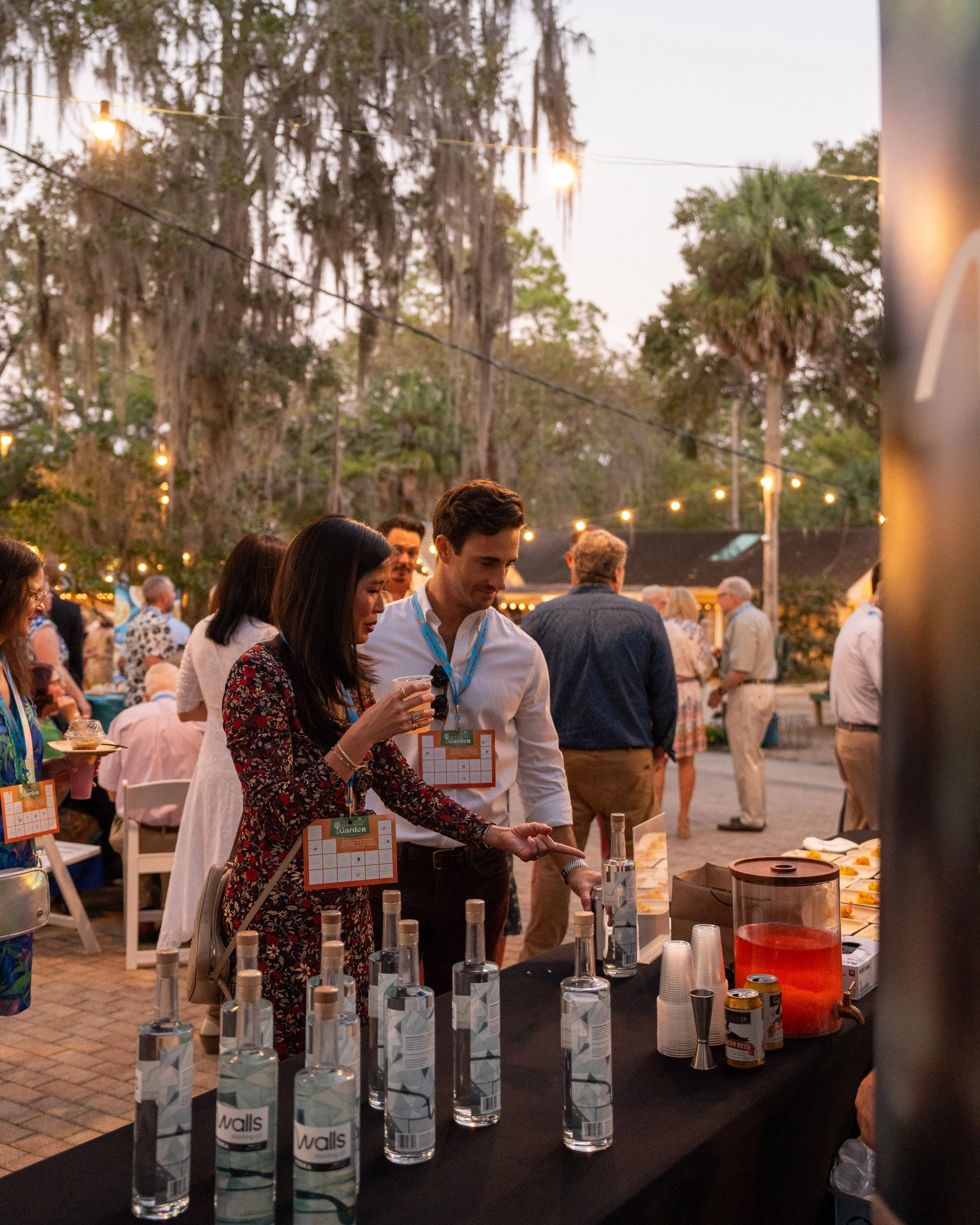 Guests inquiring about Walls Distilling Co.'s Vodka in the Strawberry Moscow Mules