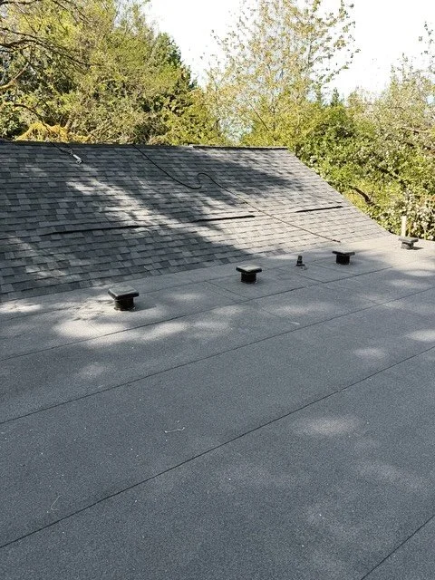 This roof features Landmark Pro in Moire Black paired with Flintlastic SA in Moire Black for a bold, seamless look that delivers both style and durability.

Ready to upgrade your roof? Call today for a free estimate 360-258-0936!