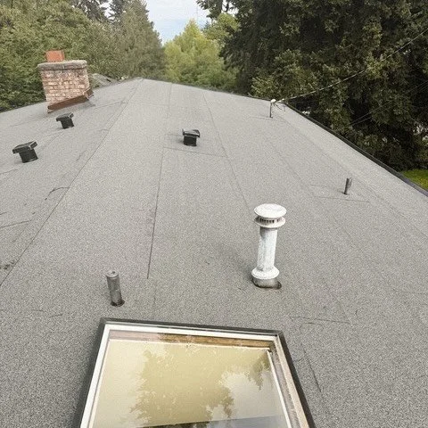 New roof completed in SeaTac, WA! 

This home was upgraded with Flintlastic Colonial Slate, a durable roofing system designed for low slope and flat roofs. It provides long lasting waterproof protection while offering the beautiful look of natural sl