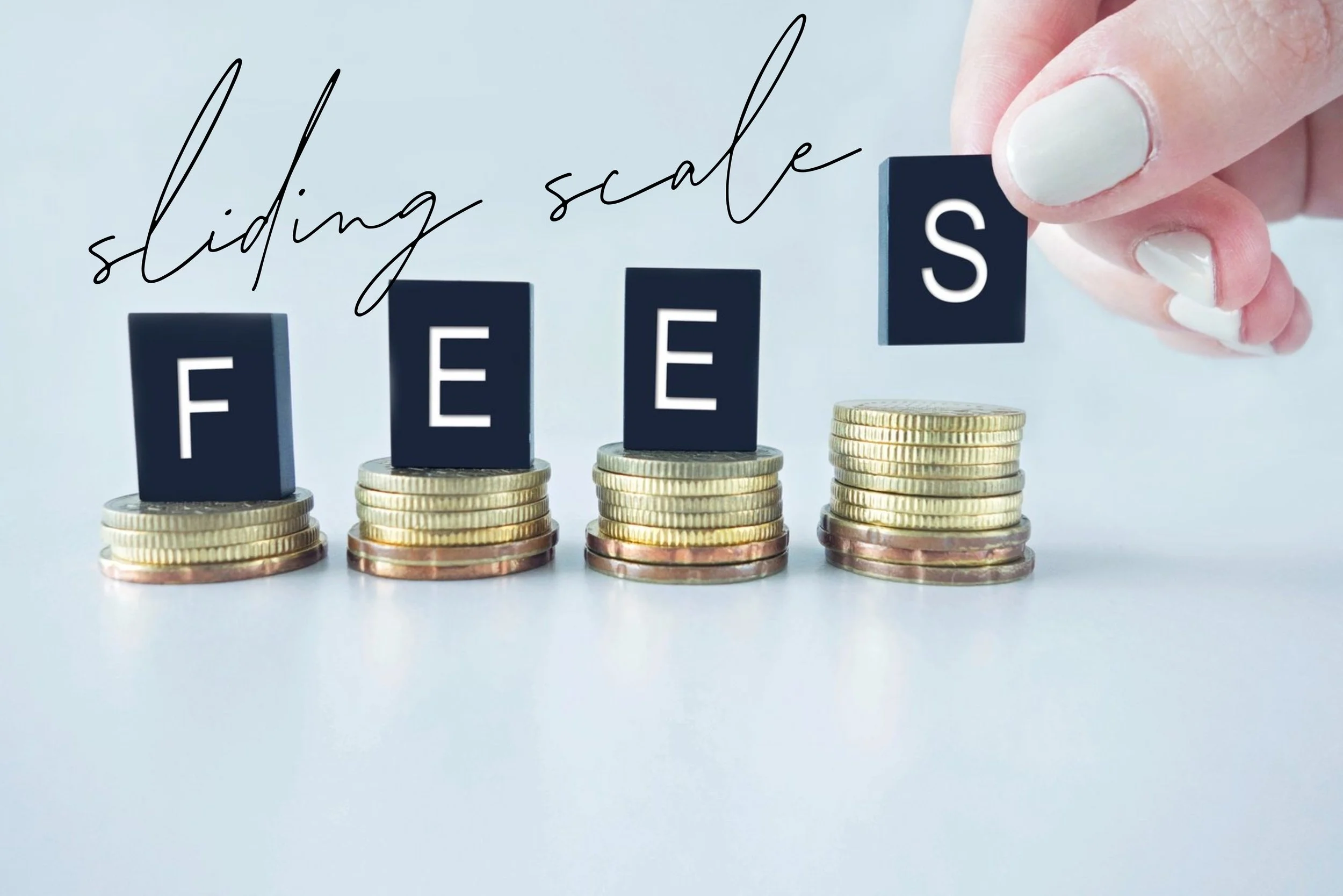 Coins stacked with blocks spelling 'FEES', hand adding block, text 'sliding scale' above.
