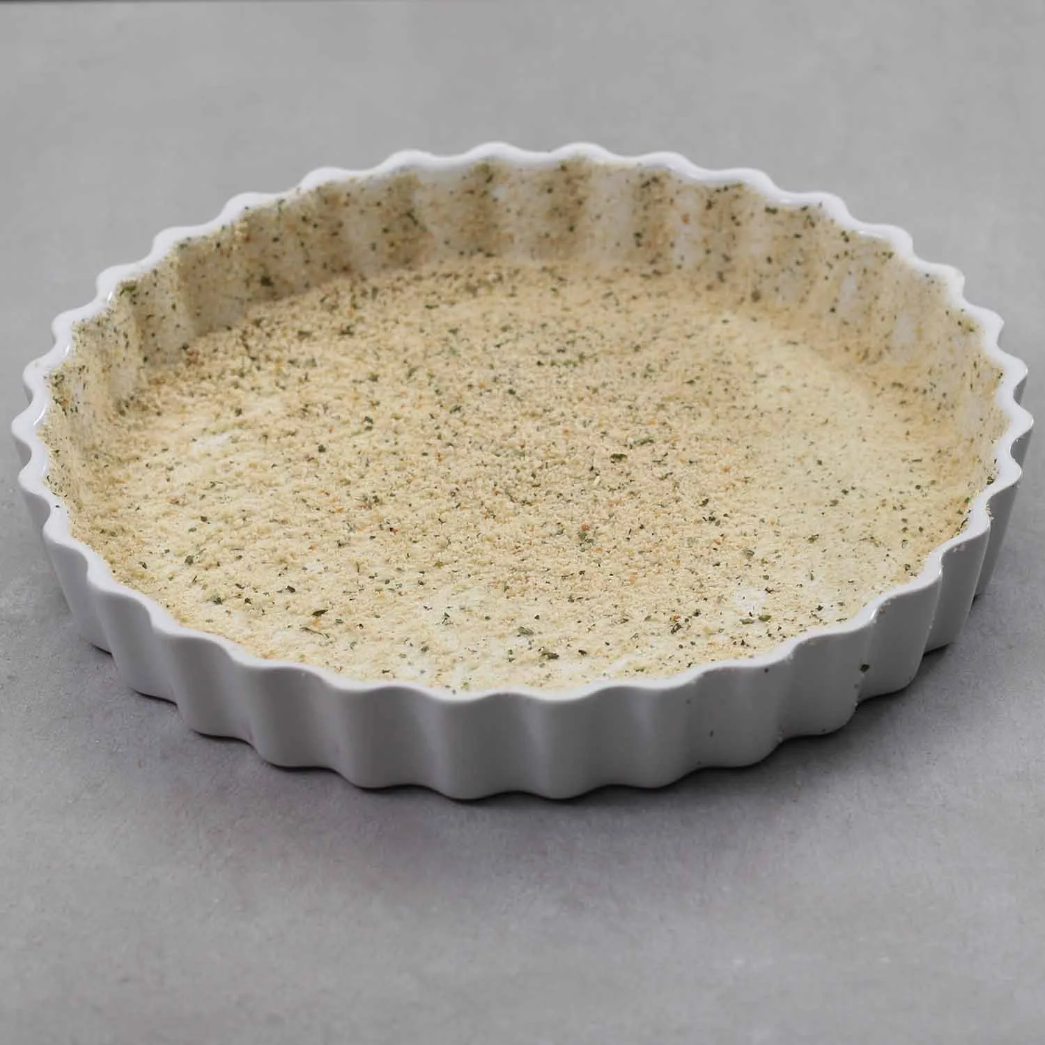 quiche-dish-coated-with-vegetable-shortening-and-bread-crumbs-for-non-stick-casserole