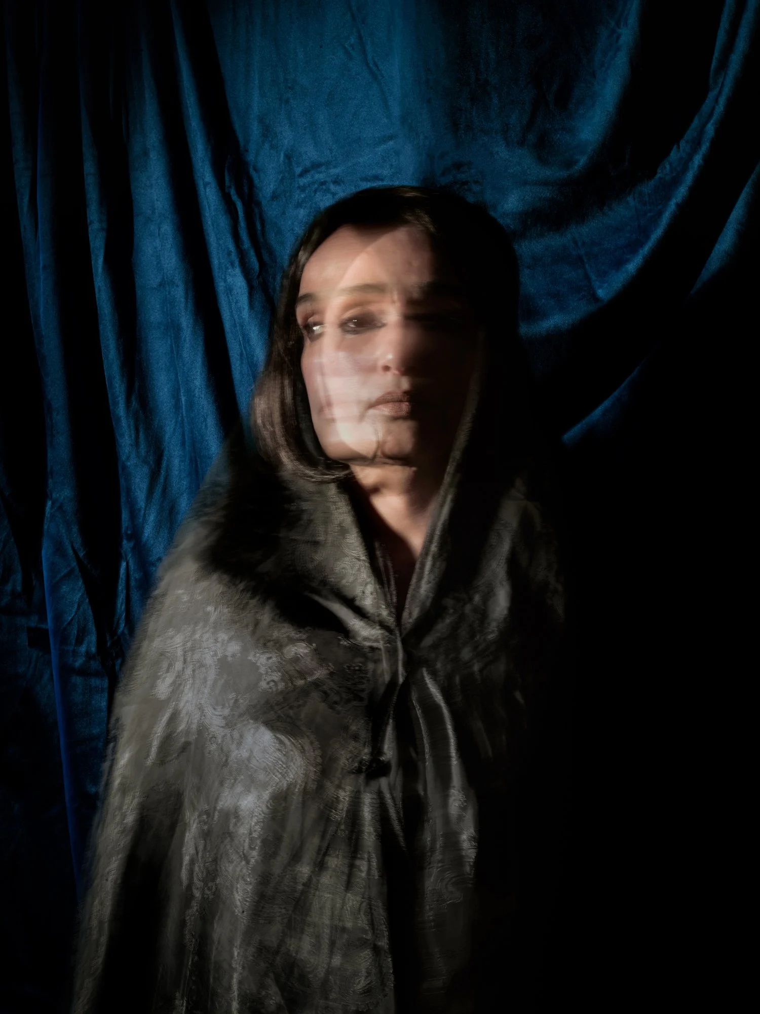   ADAPTING THE UNFITTING    2025 - 2026/ONGOING   Adapting the Unfitting" (2025–2026 / Ongoing) is a self-portrait series exploring the dissonance of belonging. Through layered gestures and veiled interiors, it confronts the emotional tension of exis