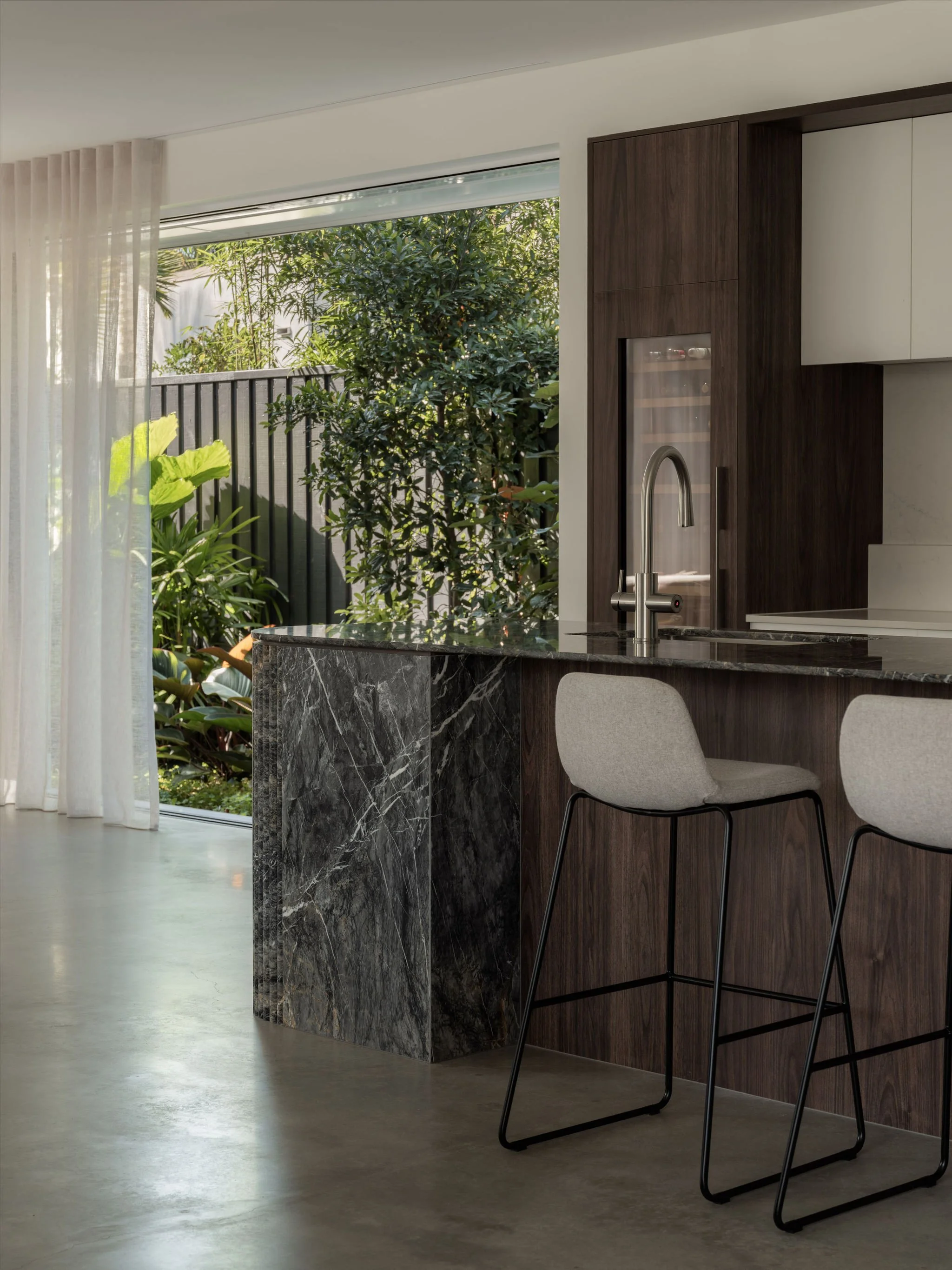 Parklane Place home Bulimba - kitchen with garden access. Interiors by Borgeaud Interiors.