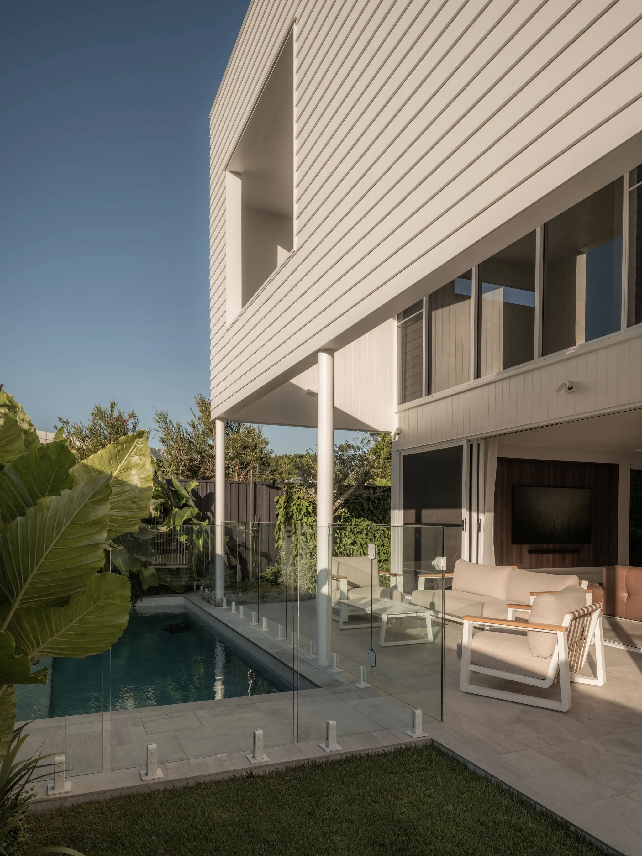 Parklane Place home Bulimba - pool and outdoor entertaing. Interiors by Borgeaud Interiors.