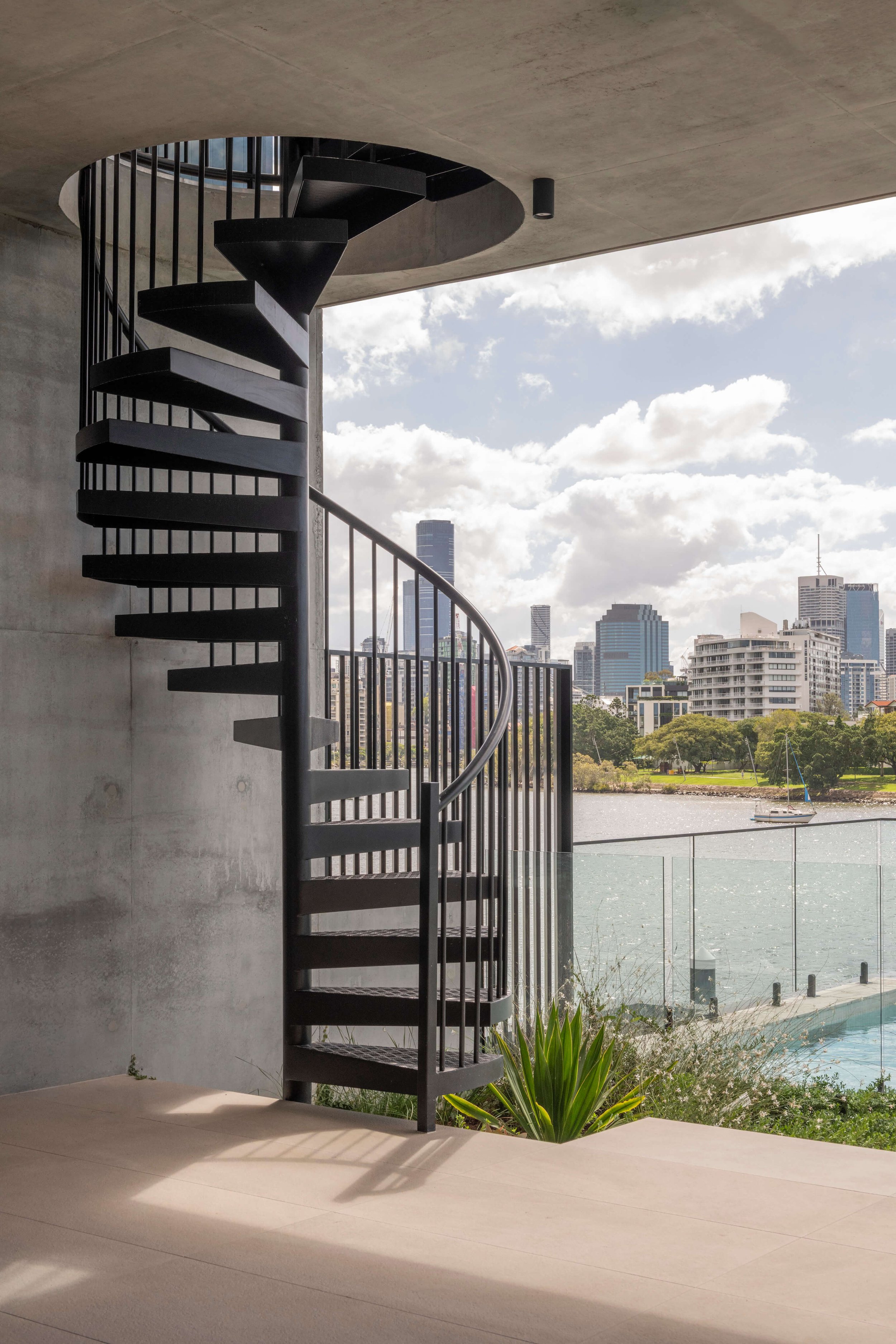 Akuna Laidlaw home East Brisbane - spiral external staircase. Interiors by Borgeaud Interiors.