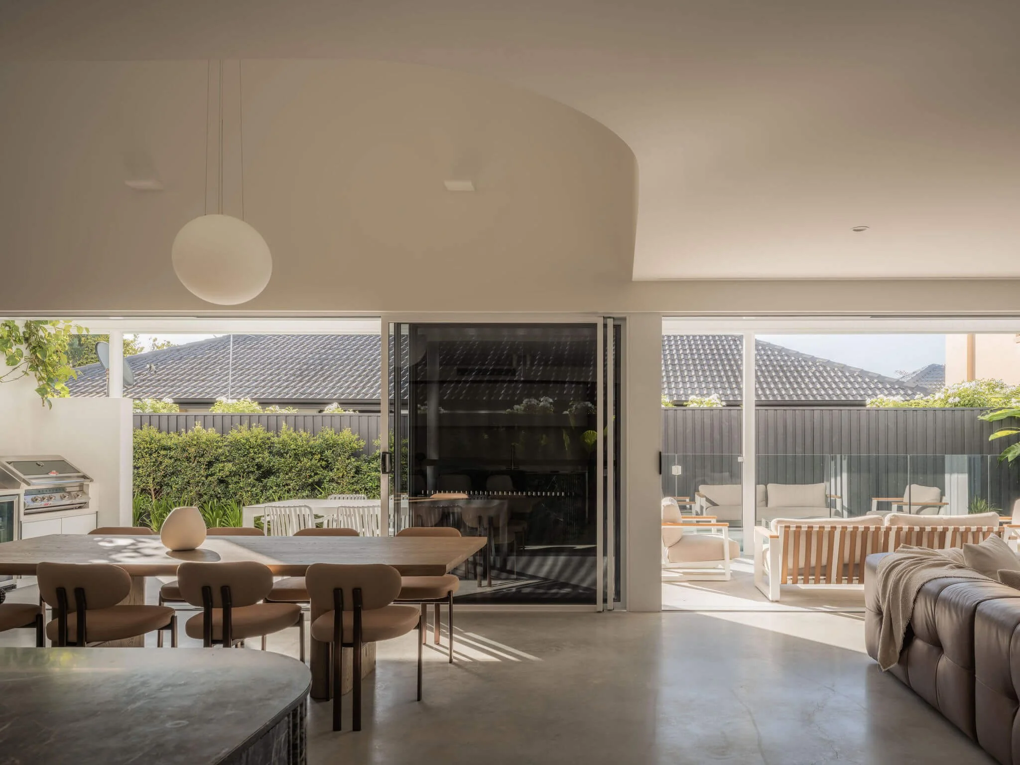 Parklane Place home Bulimba - open plan living and dining. Interiors by Borgeaud Interiors.