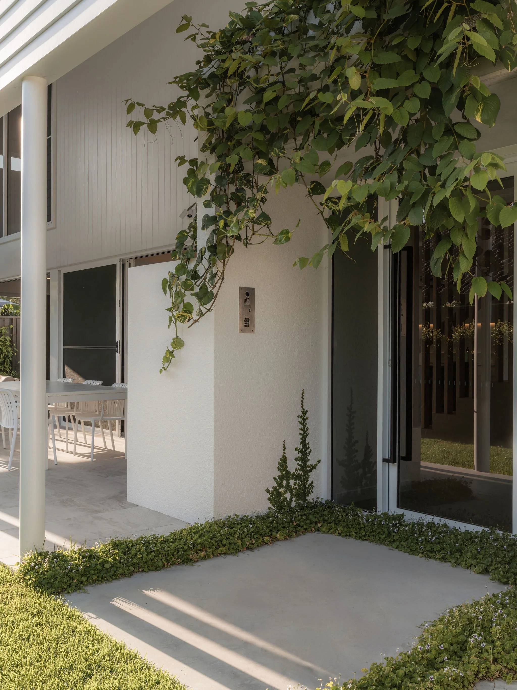 Parklane Place home Bulimba - landscaping. Interiors by Borgeaud Interiors.