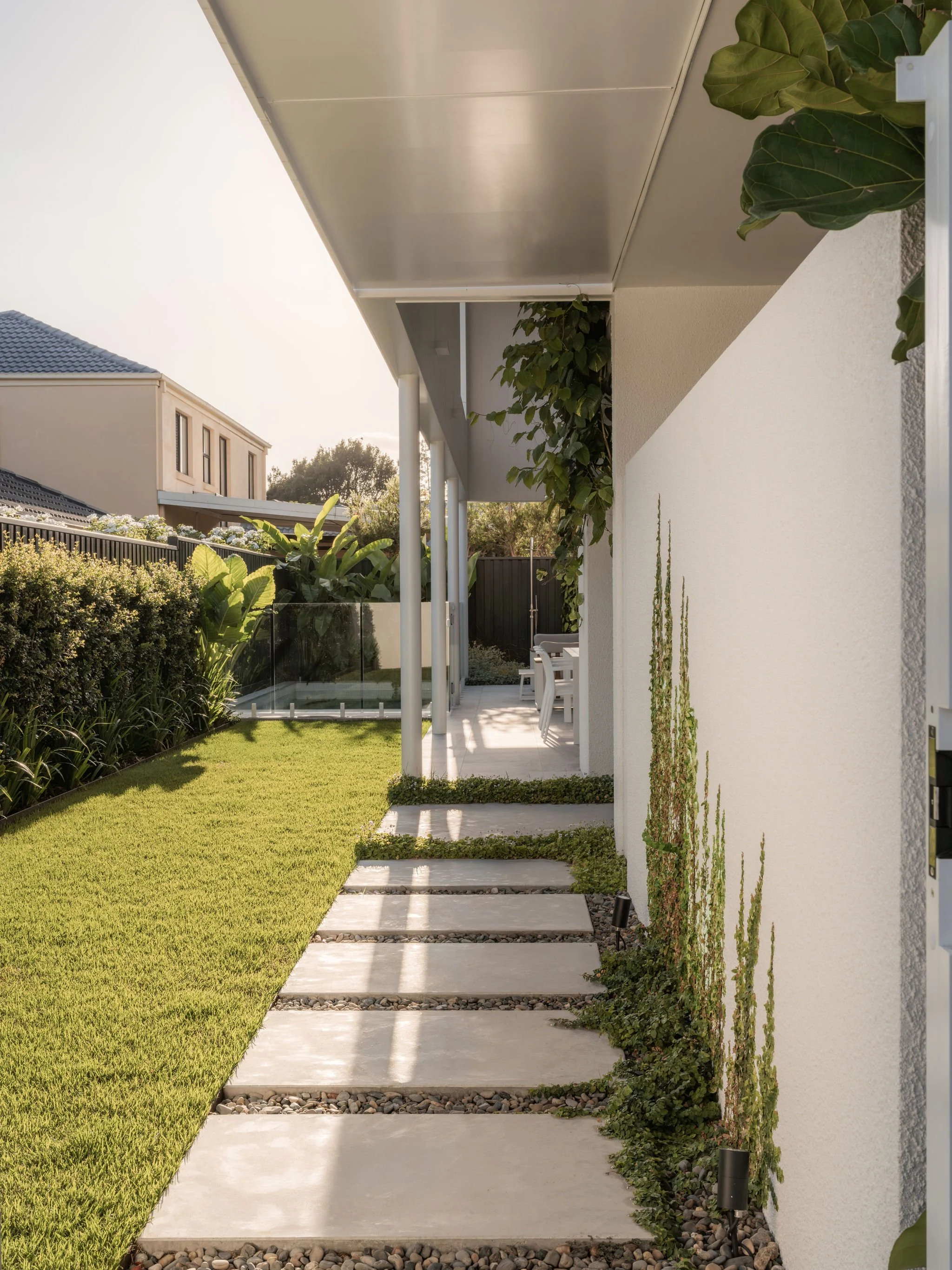 Parklane Place home Bulimba - garden stepping stones. Interiors by Borgeaud Interiors.