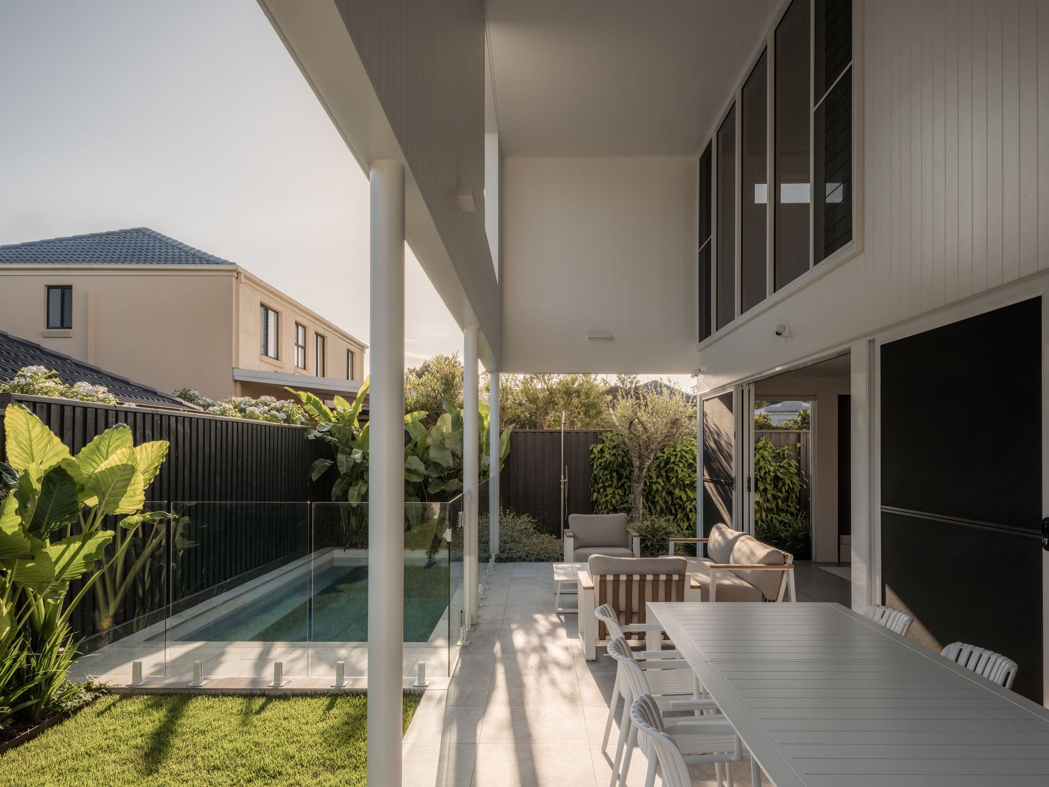 Parklane Place home Bulimba - pool and outdoor entertaing. Interiors by Borgeaud Interiors.