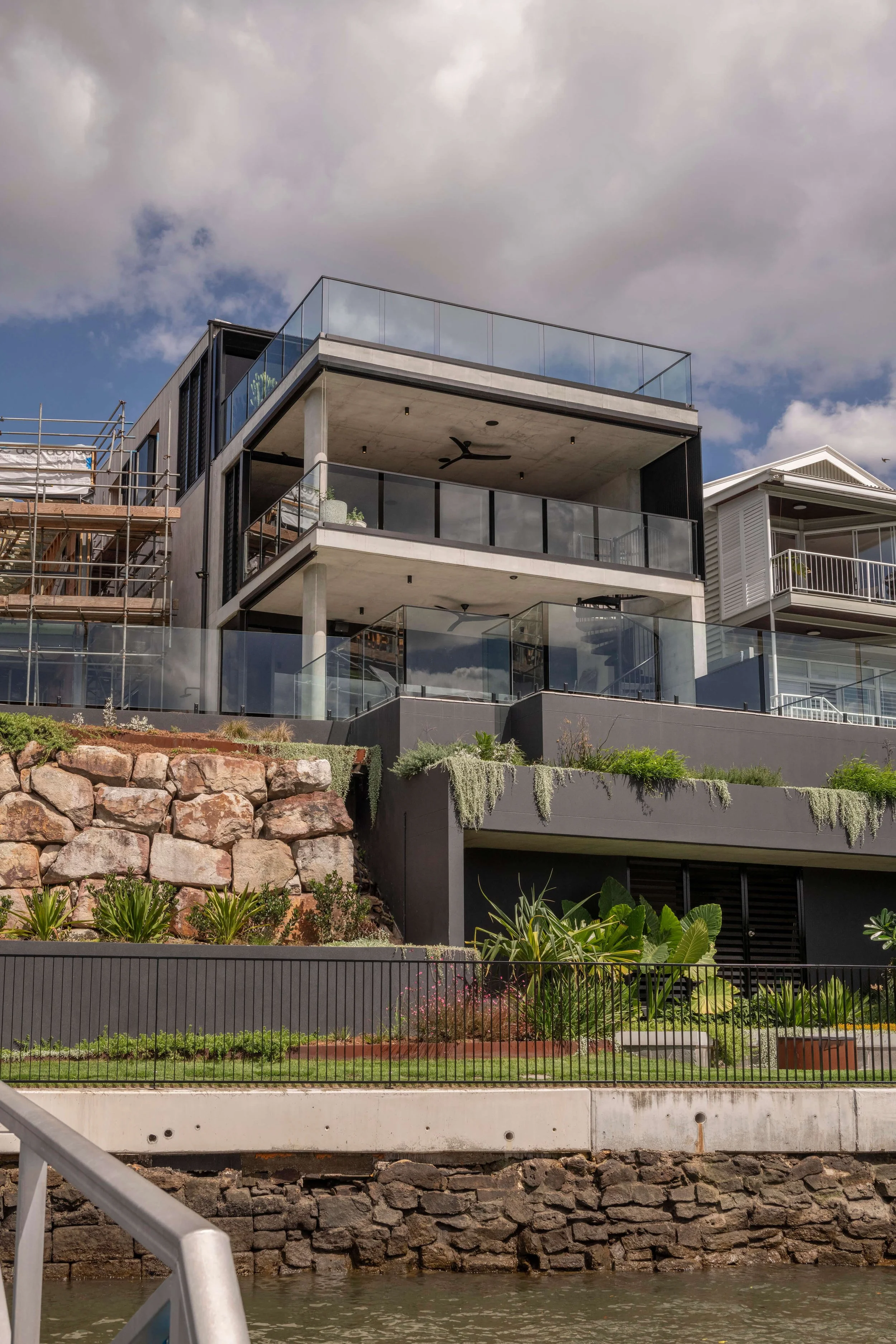 Akuna Laidlaw home East Brisbane - riverfront view of house. Interiors by Borgeaud Interiors.