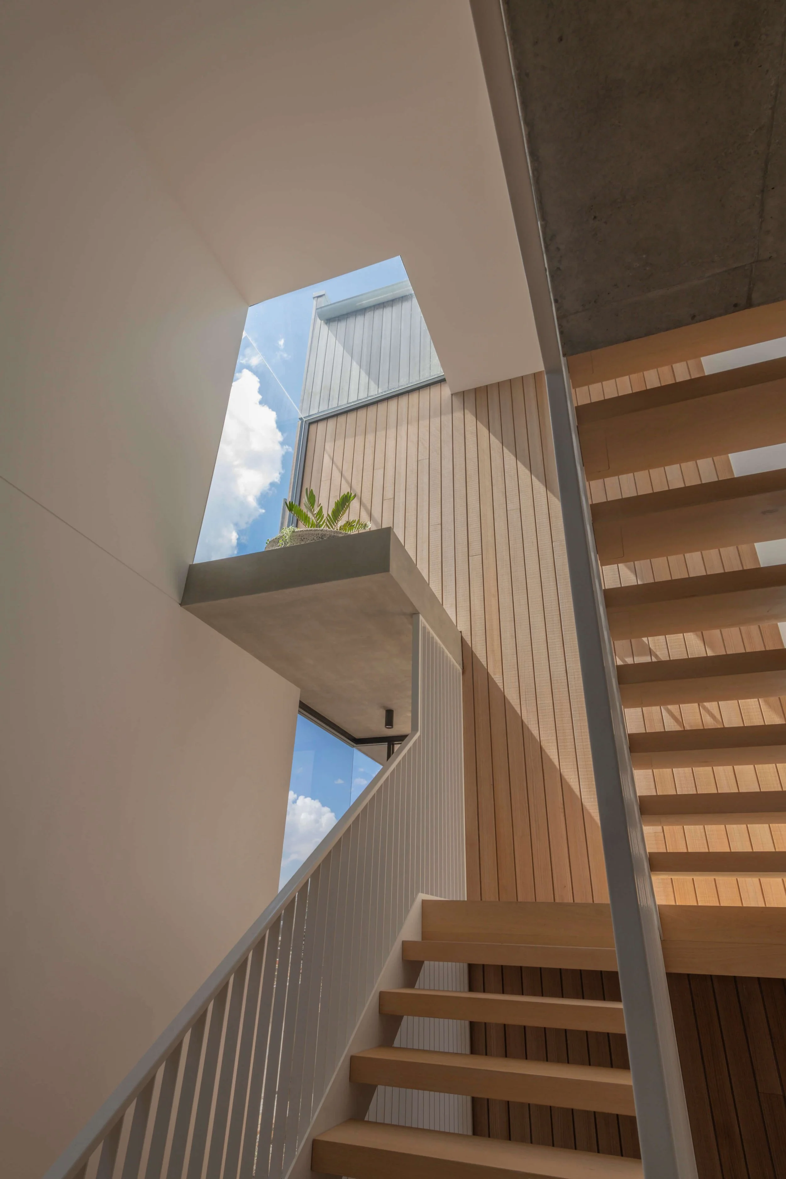 Akuna Laidlaw home East Brisbane - stairwell. Interiors by Borgeaud Interiors.