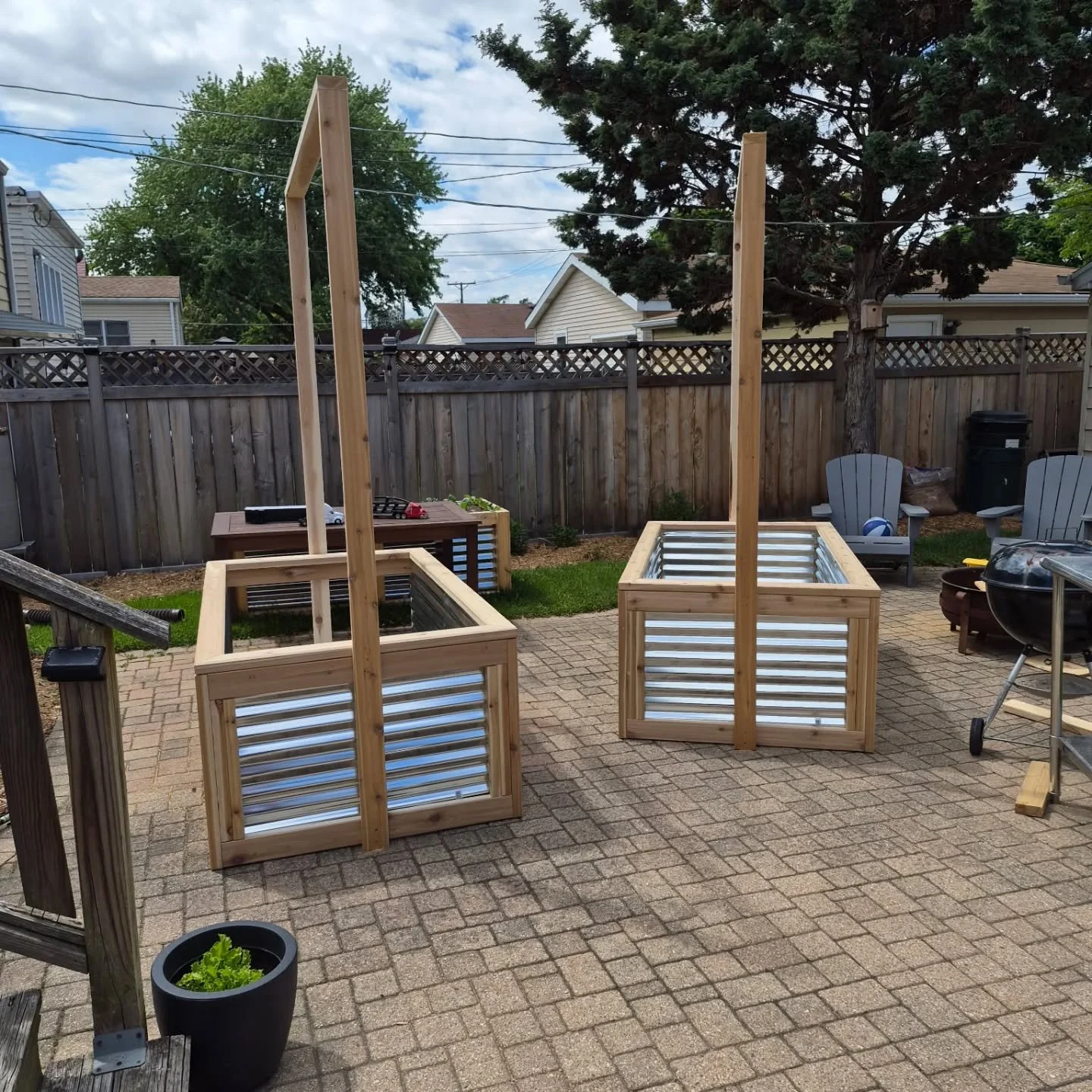 A friend and trusted contractor built these GORGEOUS 3x6 galvanized steel and cedar raised beds for me! I asked him to not attach chicken wire and instead drill holes in the top so I can string trellis things like tomatoes and cucumbers if I want to.