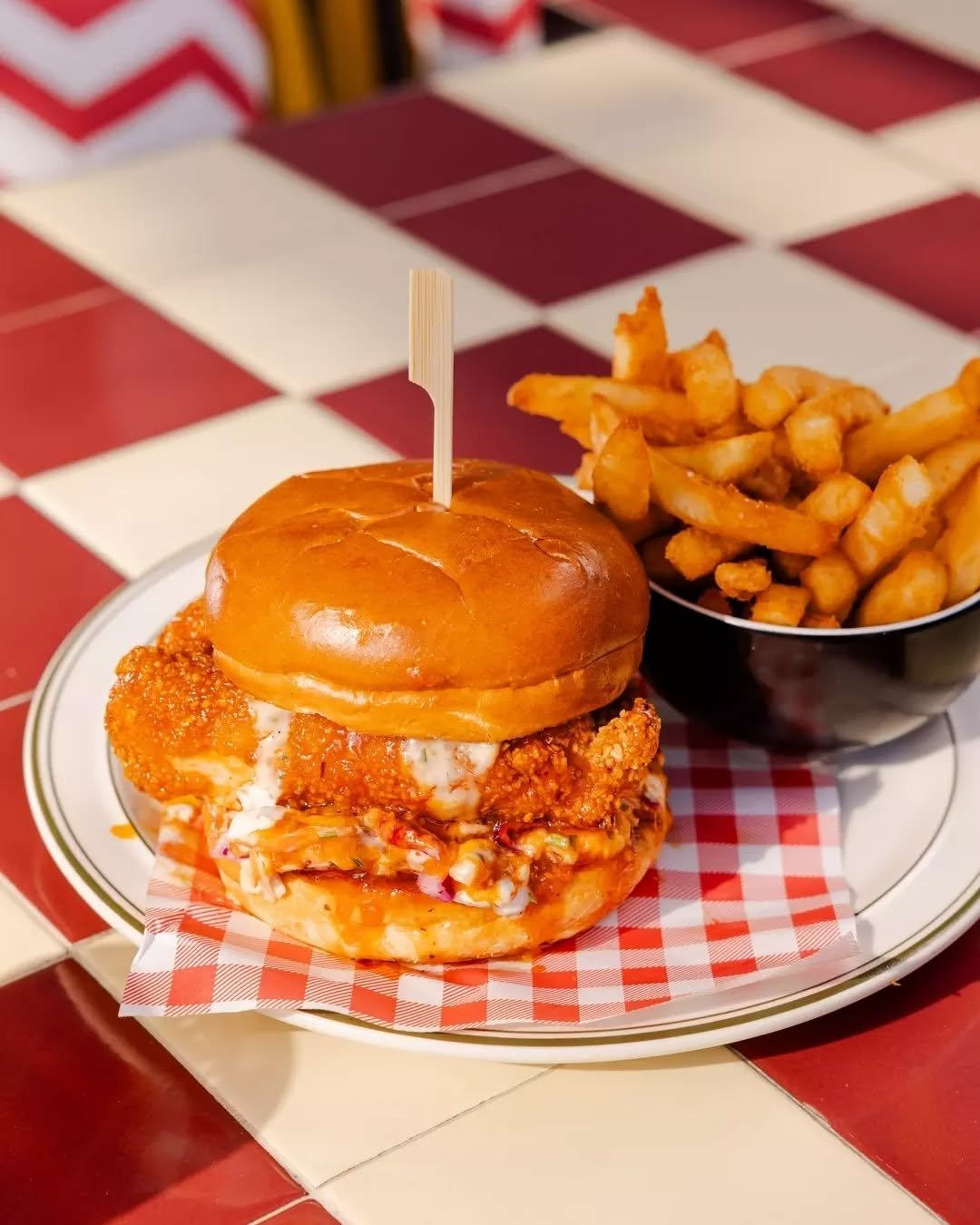 Yummy burger comin' at you this Friday 🍔🔥&nbsp;Buffalo fried chicken burger, ranch sauce, slaw and chippies for $18. Add a pint for $25 🍺