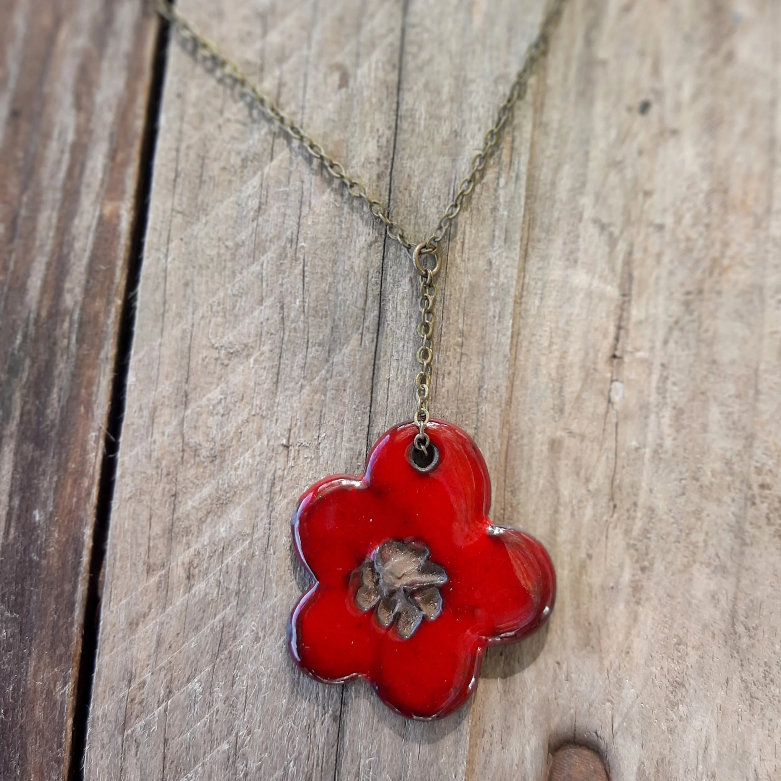Handmade ceramic flower pendant , dark red