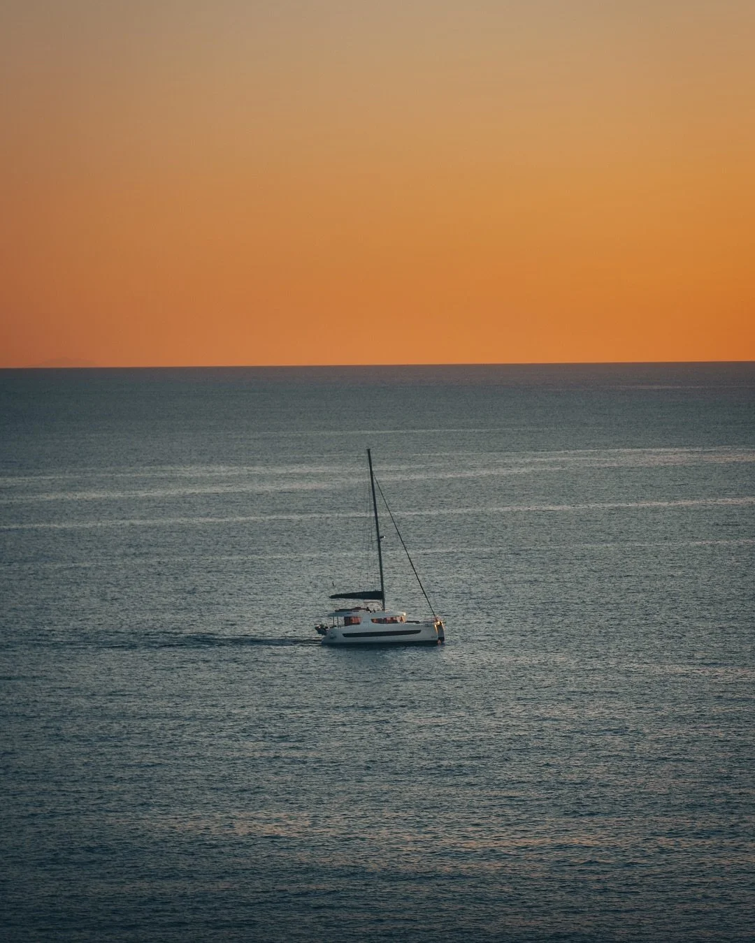 The sunsets in Ibiza became a cherished ritual during my months on the island. I would find myself captivated by the shimmering water and boats drifting by, soaking in the tranquil beauty that made every sunset feel like a gift.