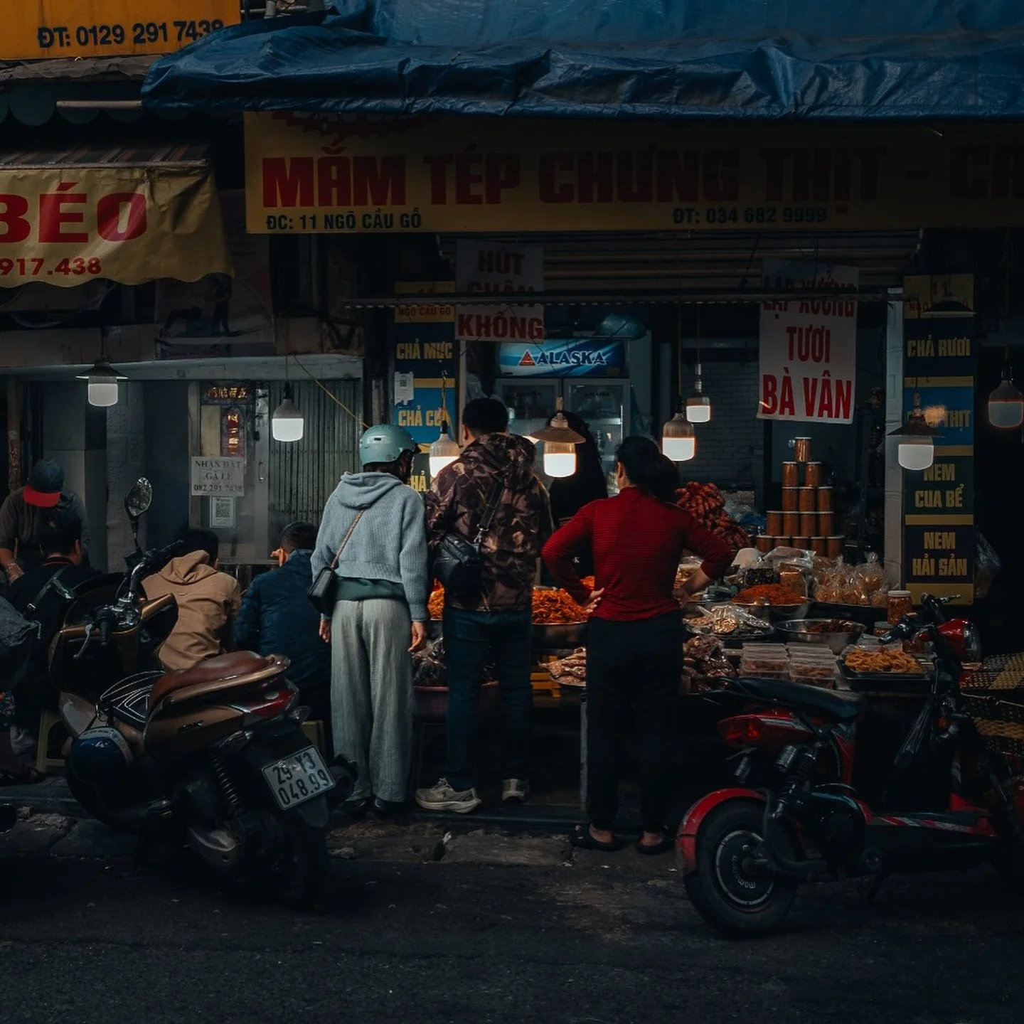 &ldquo;Where the light falls.&rdquo;
At dawn in Ho Chi Minh, the market begins to stir. Soft light filters through the haze as people shuffle between stalls. A gentle choreography of everyday life. 

This moment reminded me how easily we rush past be