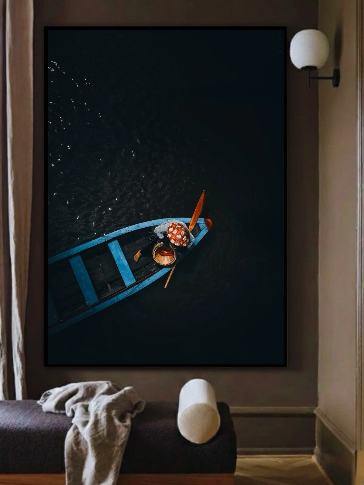 From a bridge in Vietnam, I looked down and saw her.

A woman in a small boat, carried by dark water.

The river held her gently.
Her colors rose against the silence.

She moved without hurry, absorbed in her own rhythm.

And for a moment, the world 