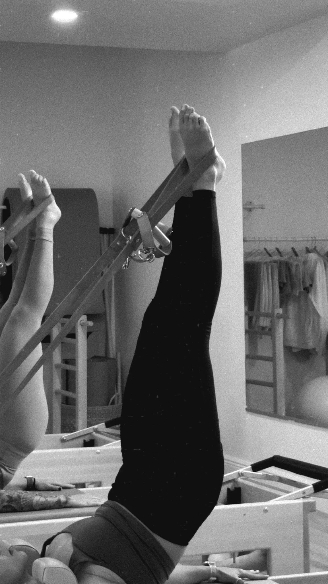 Pilates client performing reformer exercises at Ritual Body Pilates in Fort Lauderdale