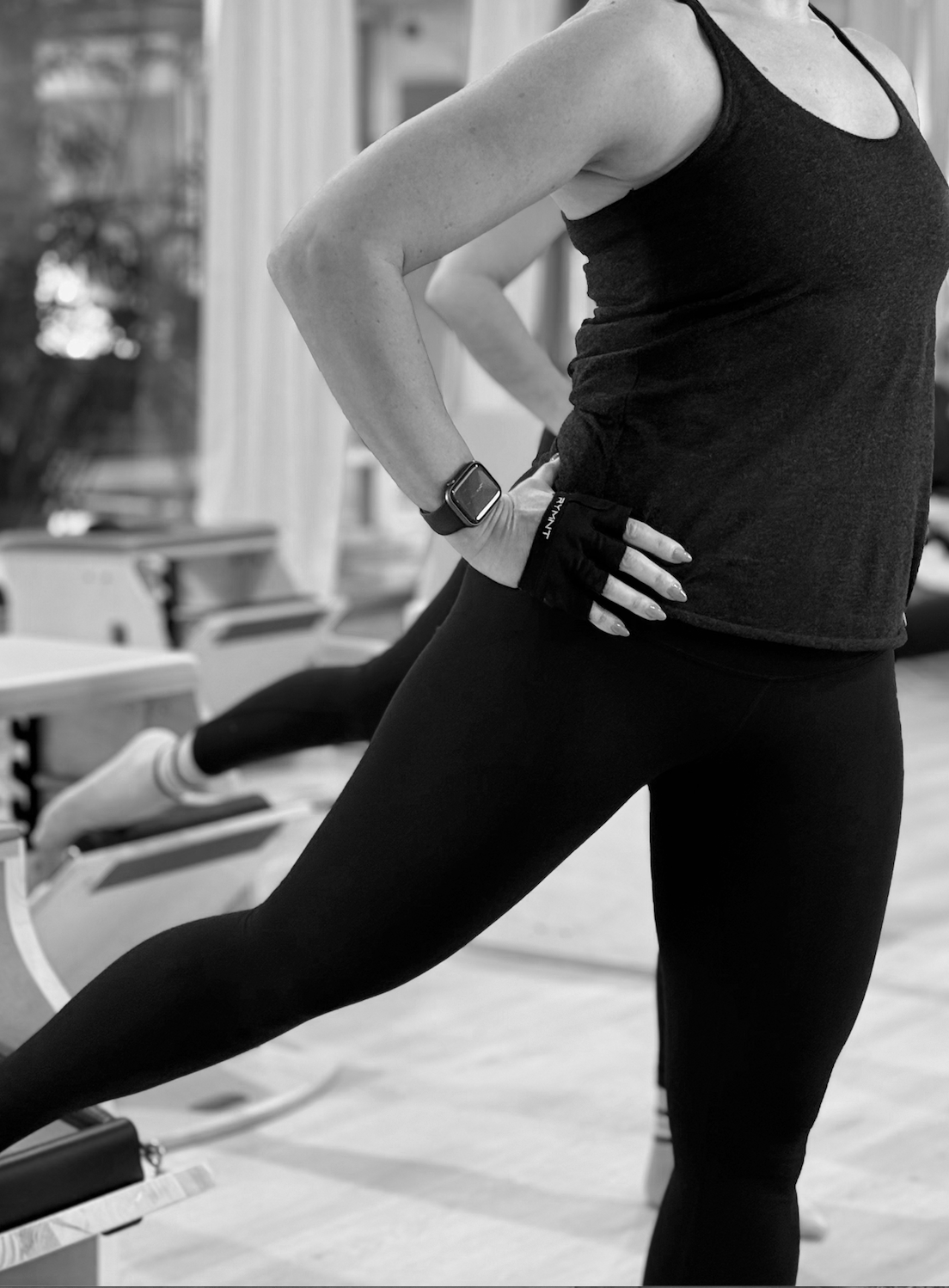 Woman on the Wunda Chair in workshop at Ritual Body Pilates in Fort Lauderdale