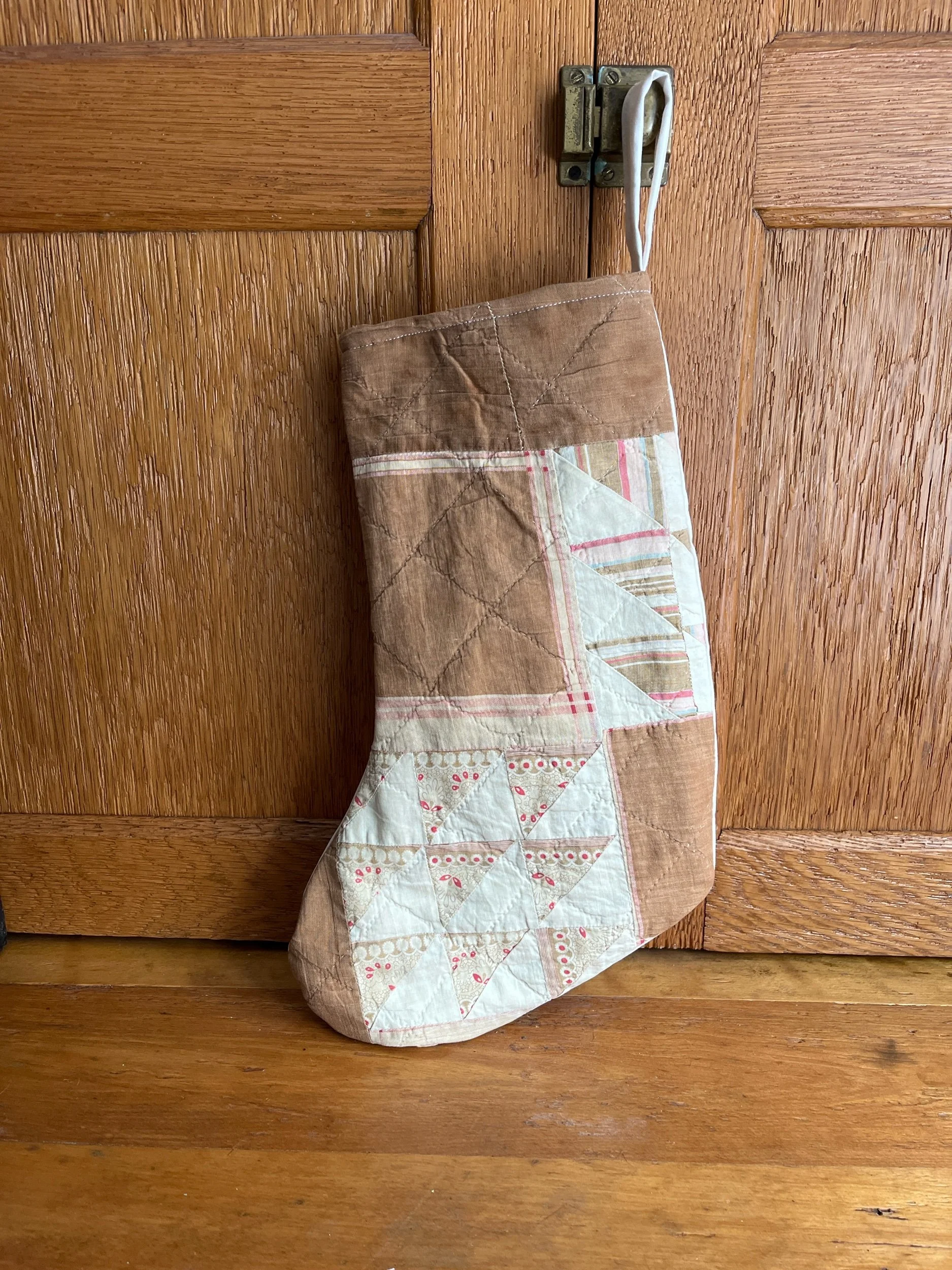 Christmas stocking made from vintage quilt