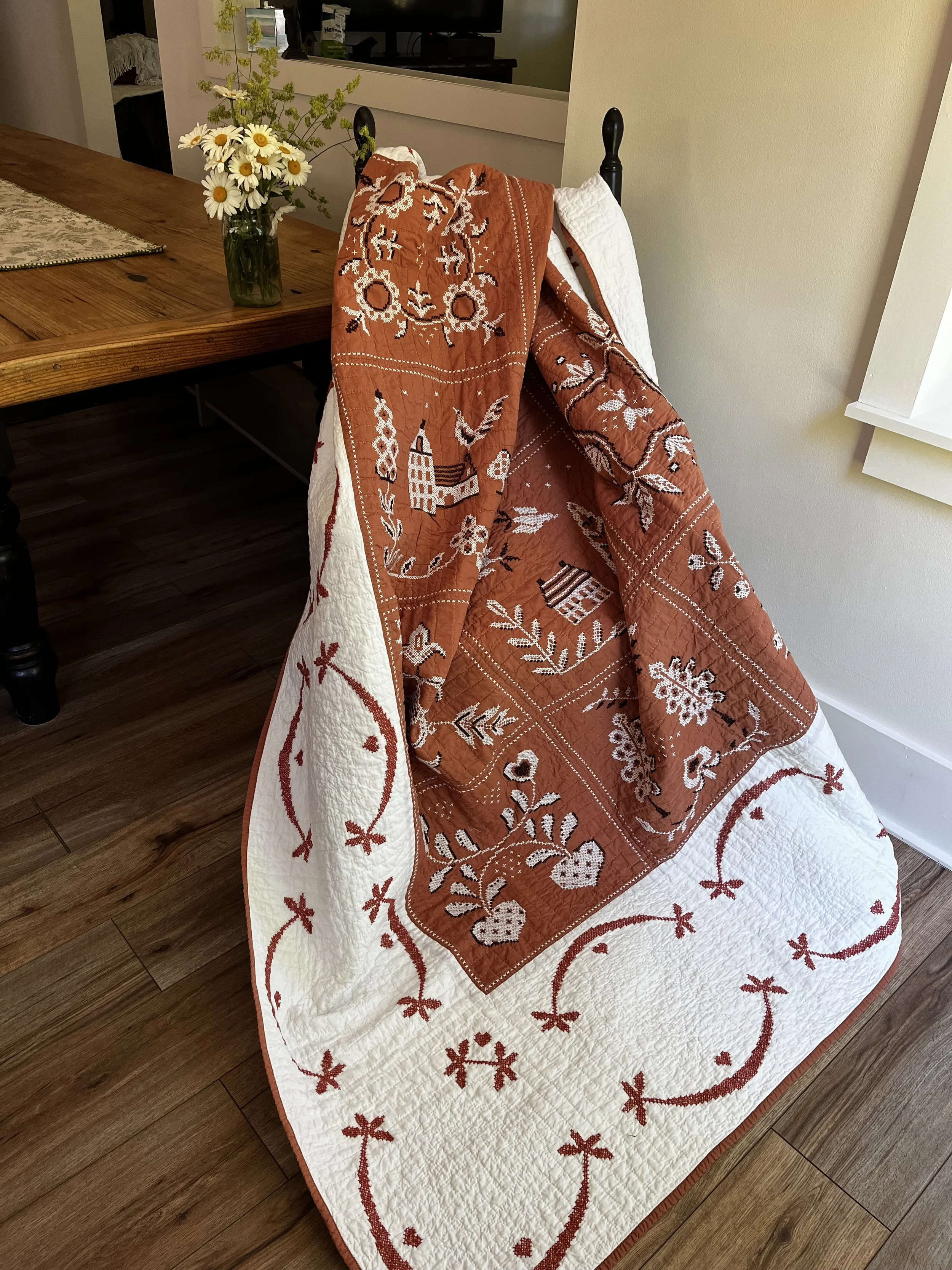 Vintage hand embroidered folk art quilt