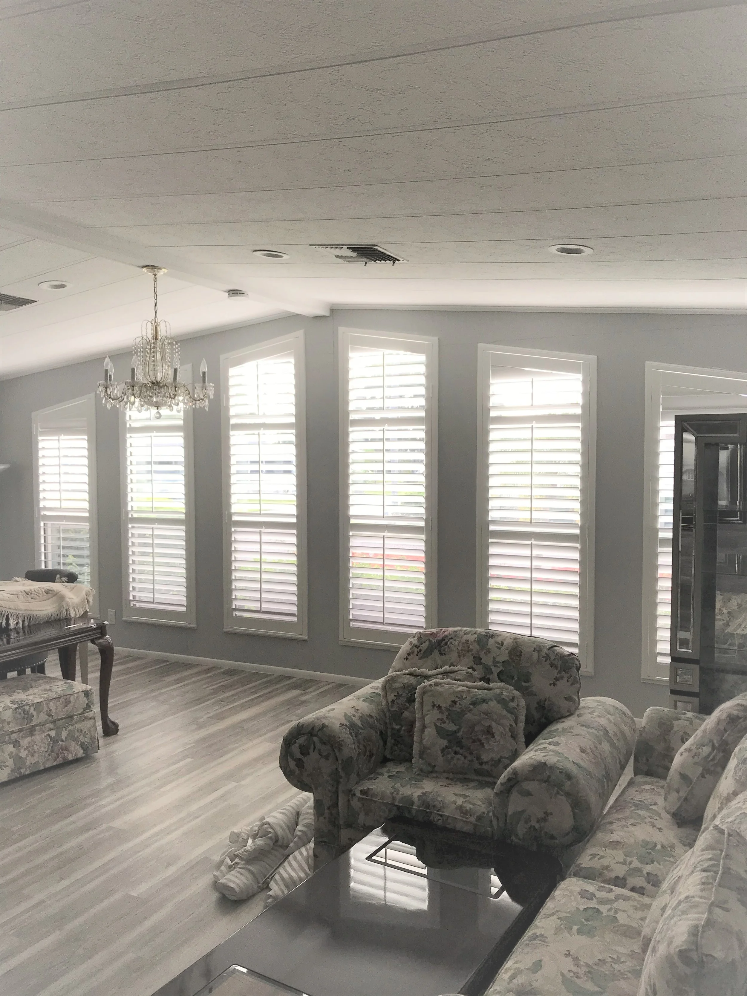 Center Tilt Rod Living Room Angled Shutter 4.5 Louvers.jpg