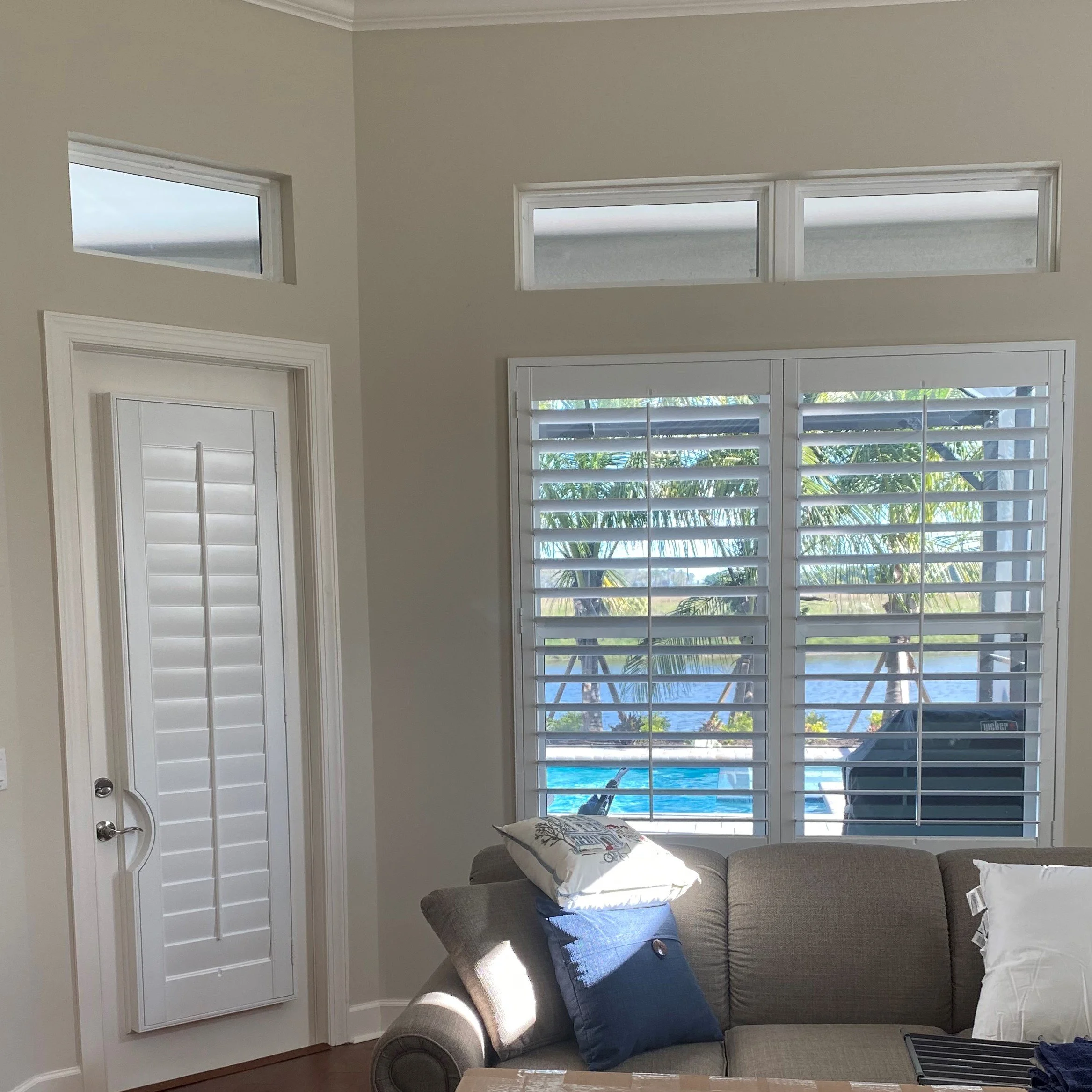 Center Tilt Rod Family Room Door with Curved Radius cut for door lever and window shutter, transom not covered.jpg