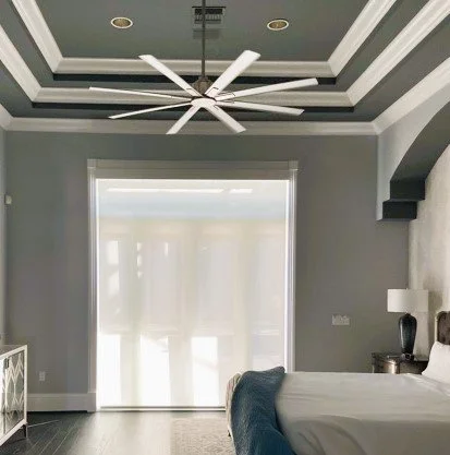 Rechargeable roller shade, the fabric is 5% bright white and finished with a plain white wood valance.jpg