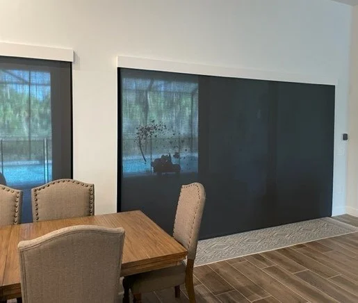 1% Charcoal roller shade with 5 inch painted wood fascia.jpg