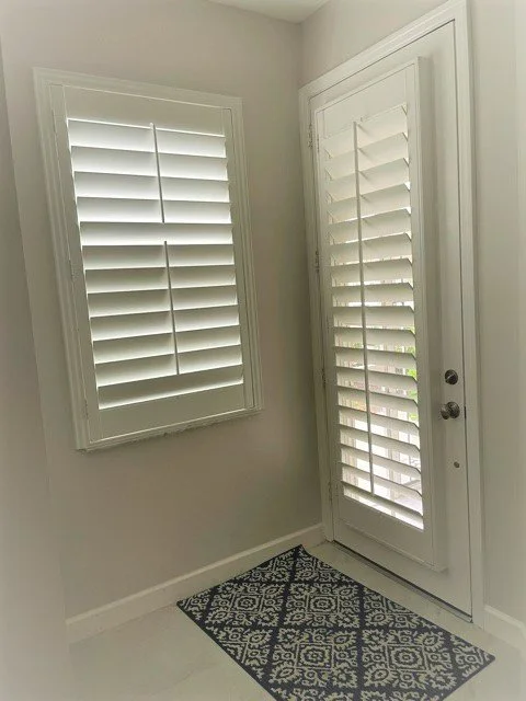 Entry Way Door with a door knob (no radius cut for lever handle needed) and Center Tilt Rod, which is cut on the window to work the top and bottom louvers separately.jpg