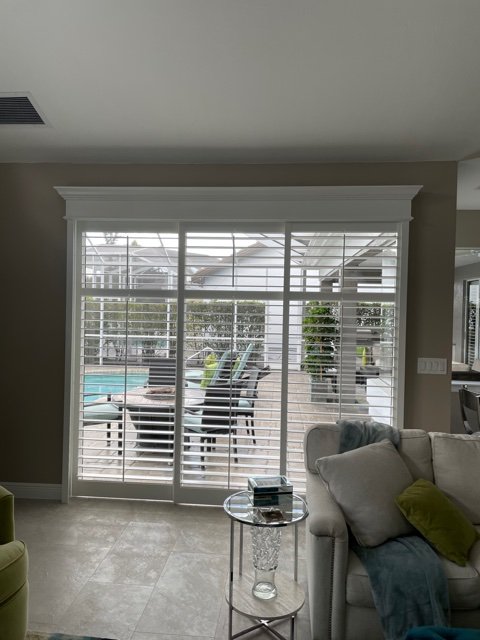 Living room, Inside Mount Sliding Shutter, 3 Panels, Center Tilt Rod with Mid-rails, Box with Crown and Bead.jpg