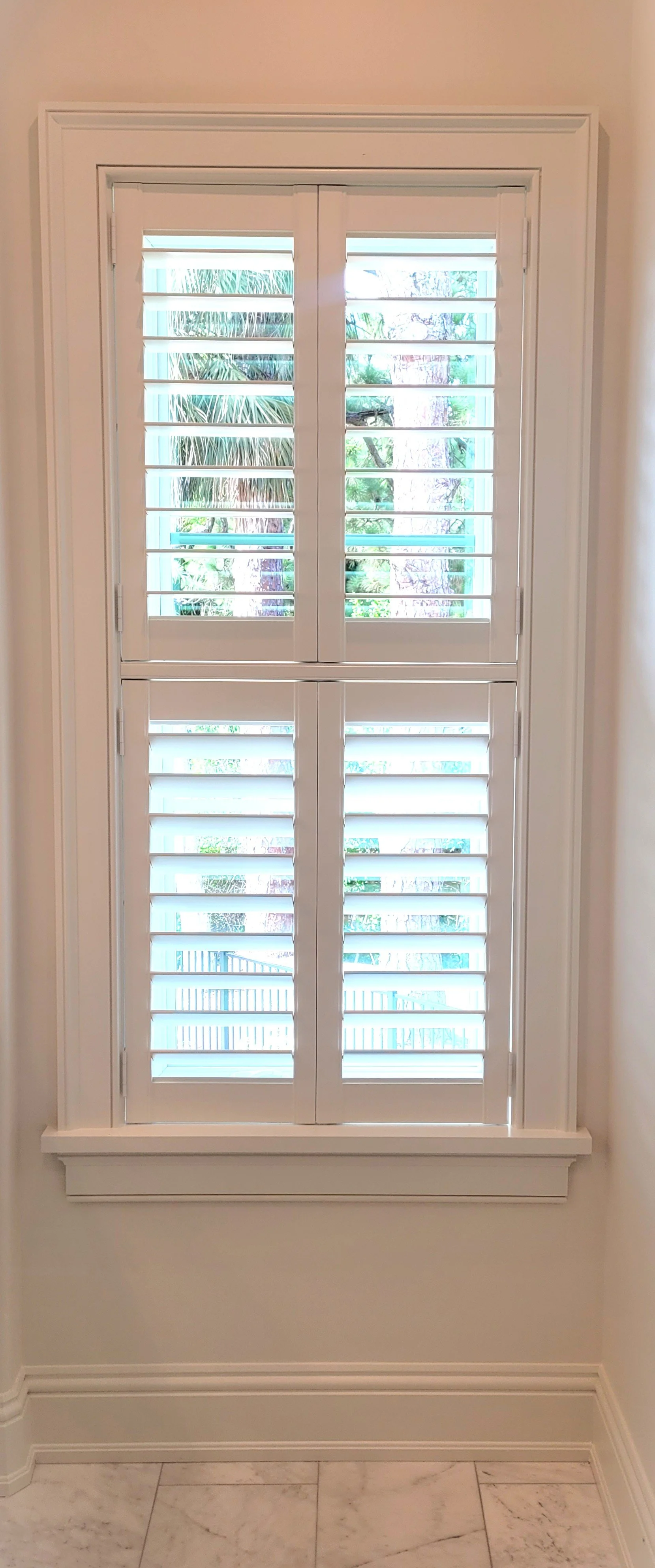 Top and bottom shutter designed with four panels.jpg