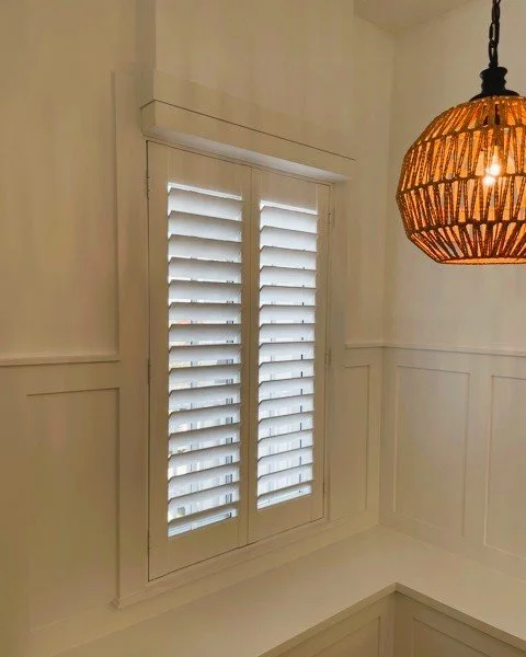 Clearview Dining Area 2 panel shutter incorporated into surrounding woodwork 3.5 Louvers.jpg