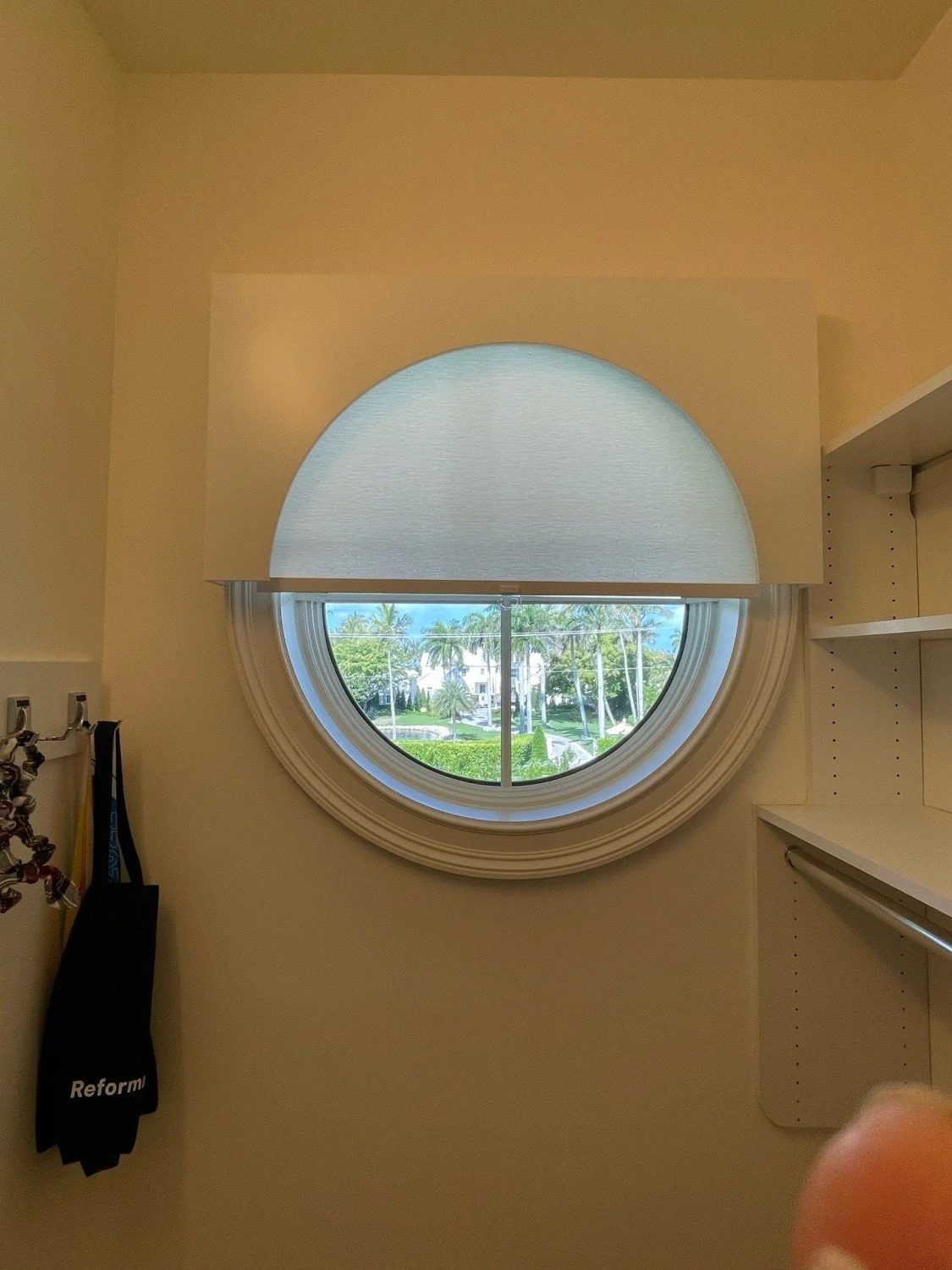 Circle window in closet 1C AFTER.jpg