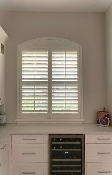 2 Panel Arch Shutter with center tilt rod.jpg