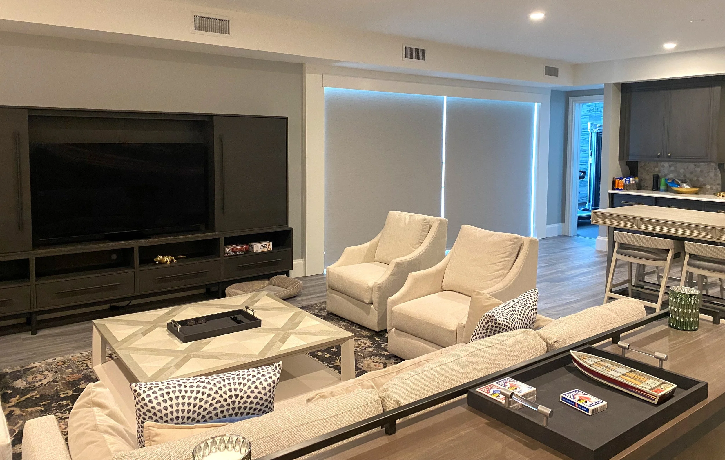 Great Room, blackout roller shades, with 6 inch plain wood valance.jpg