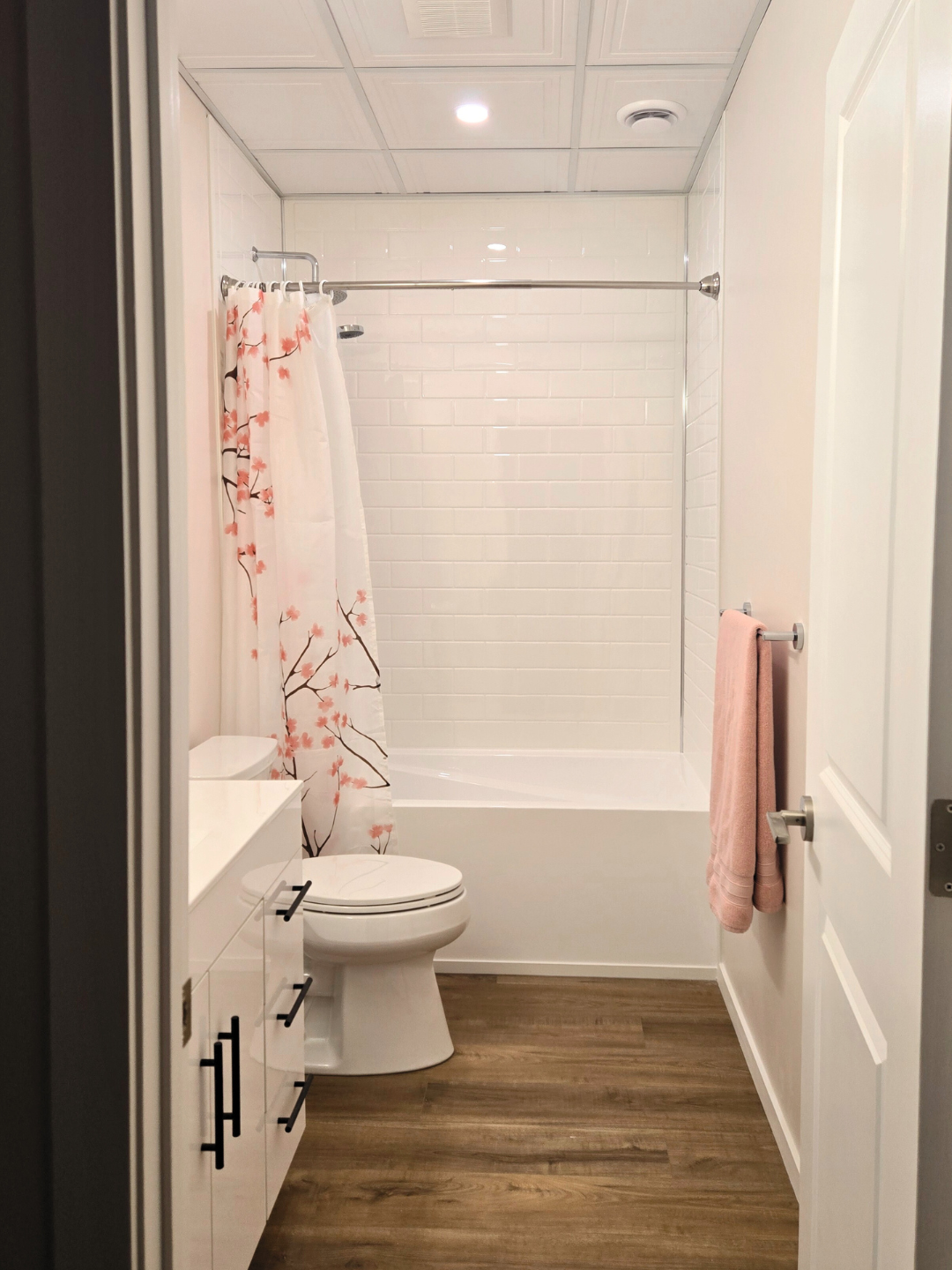 White and Pink Bathroom white shower walls