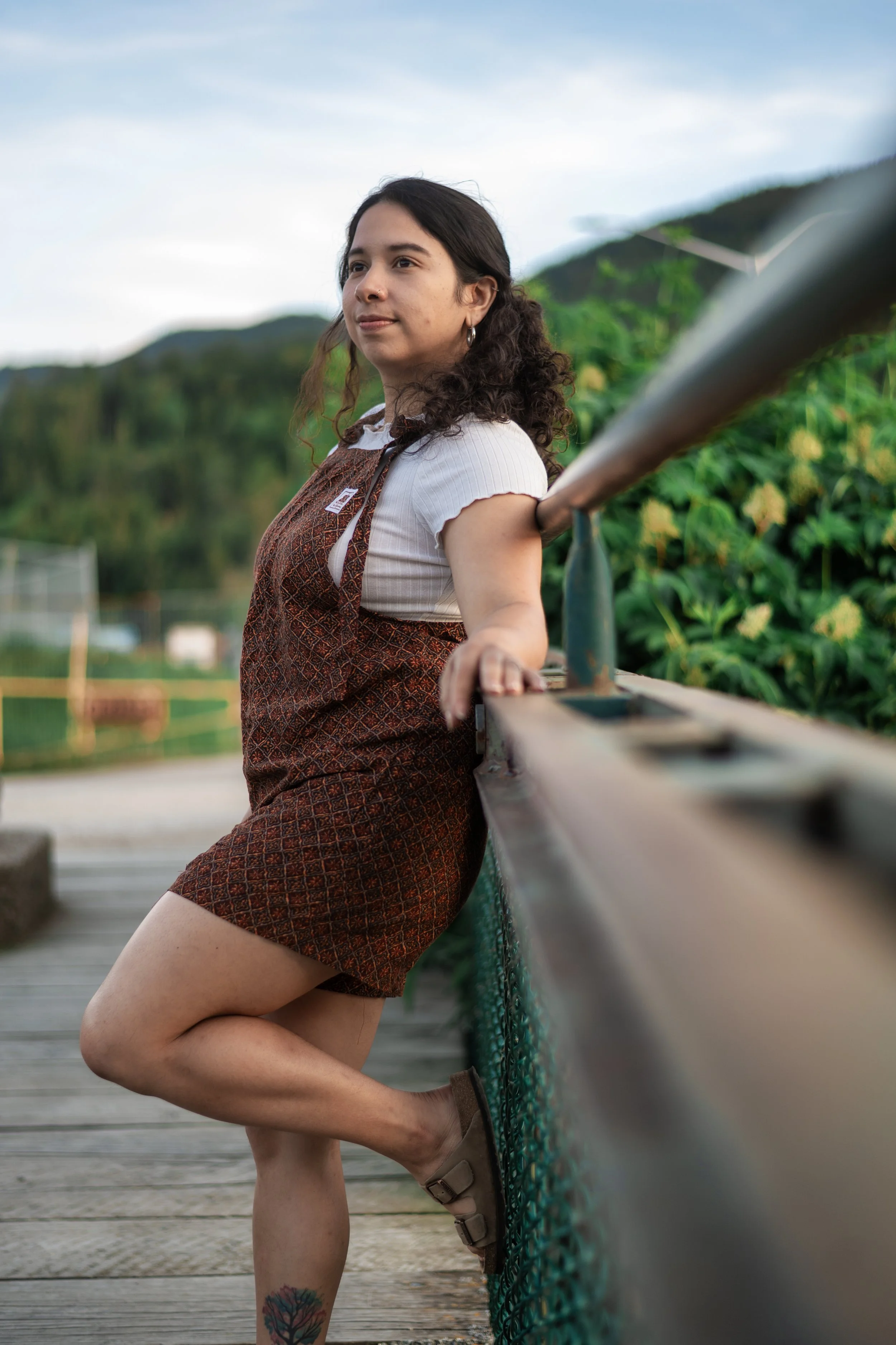 A women wear a pair of custom made Butterflies in Ballgowns short dungarees