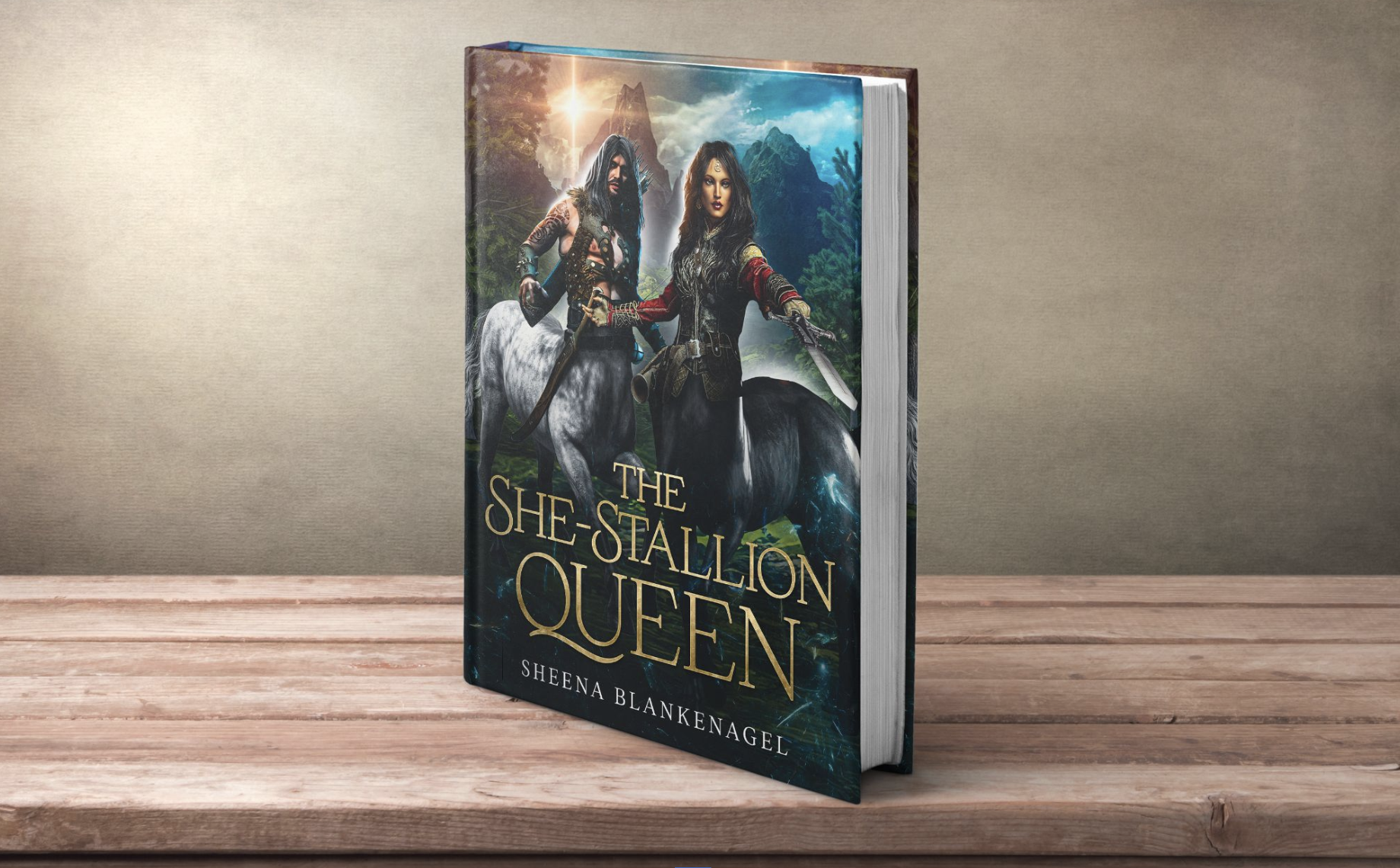 A hardcover book titled 'The She-Stallion Queen' by Sheena Blankenagel. The cover art features a woman with long dark hair in medieval armor holding a sword, riding a black horse, with another woman with long curly hair in a similar attire riding a white horse in a fantasy landscape with mountains and a glowing sky.