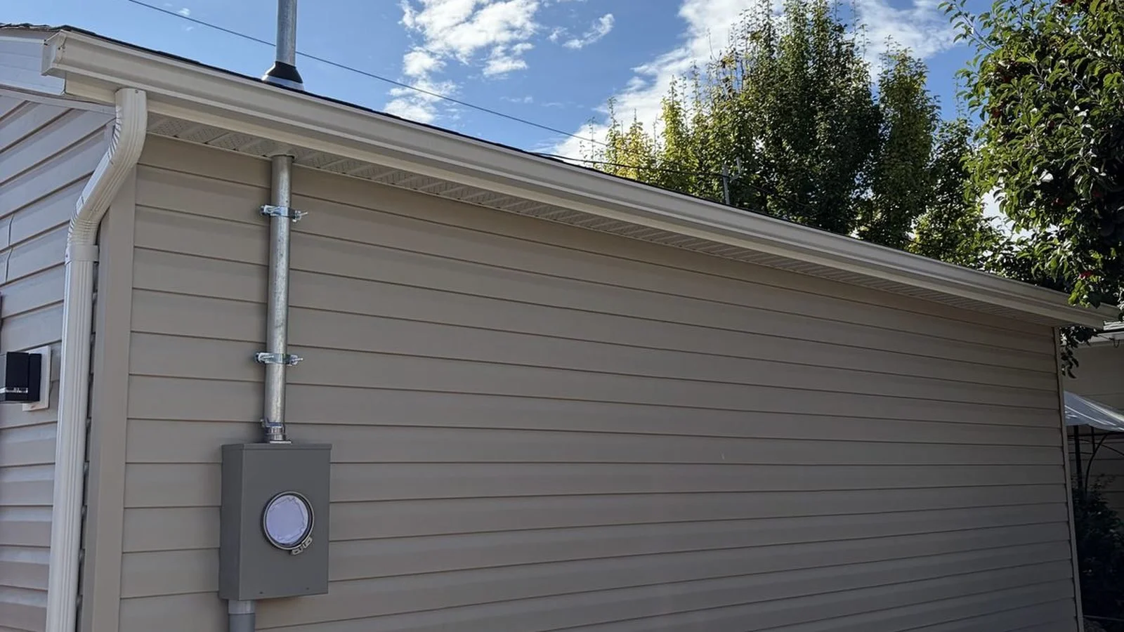 200 amp service upgrade in Dover, with the meter moved to the garage