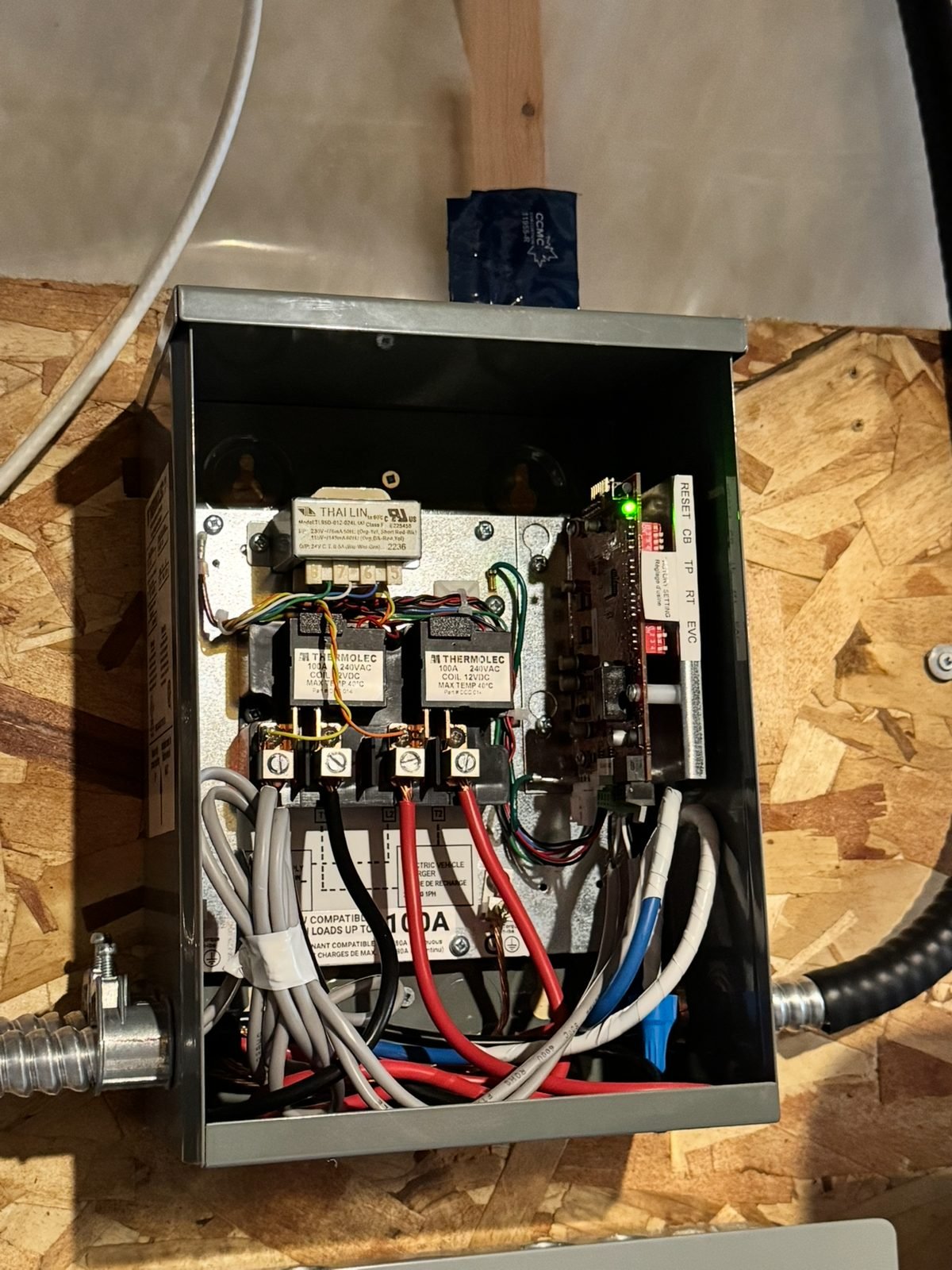 Inside the EV energy management system: the contactor and control board that pause the EV charger when the house nears its service limit