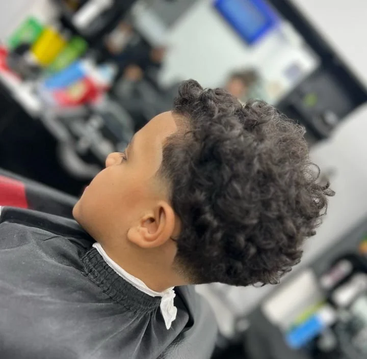 kid's curly cut