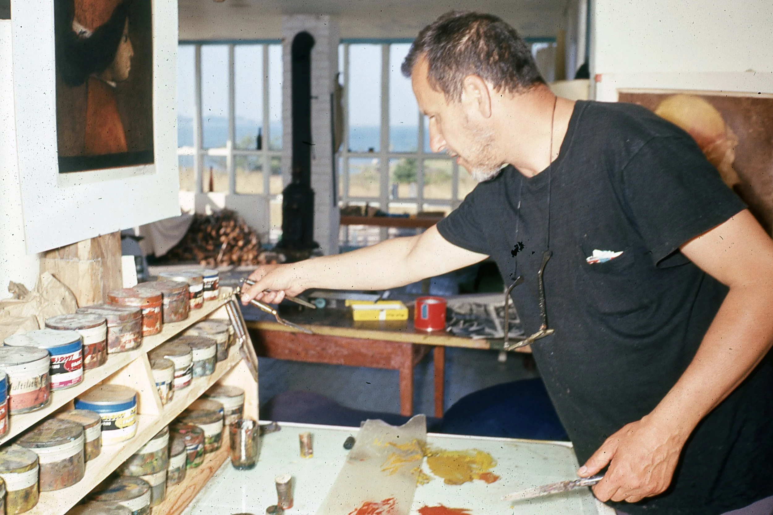   Mauricio mixing ink in his studio, Vinalhaven, ME ca. 1960  