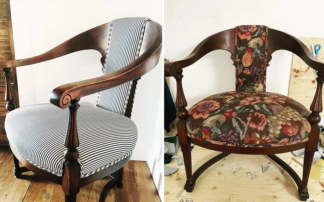 Two vintage wooden armchairs with upholstered seats and backrests, one with black and white striped fabric and the other with floral patterned fabric.
