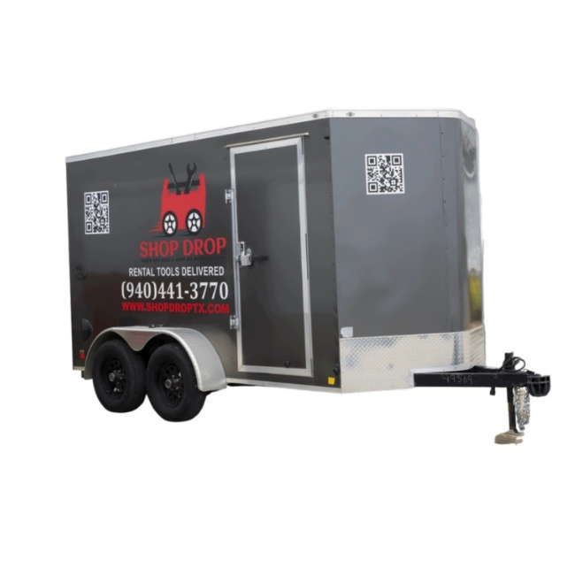 Gray rental tool trailer with a black and red logo, contact number, and website, featuring two black wheels, a door, and a tow hitch.