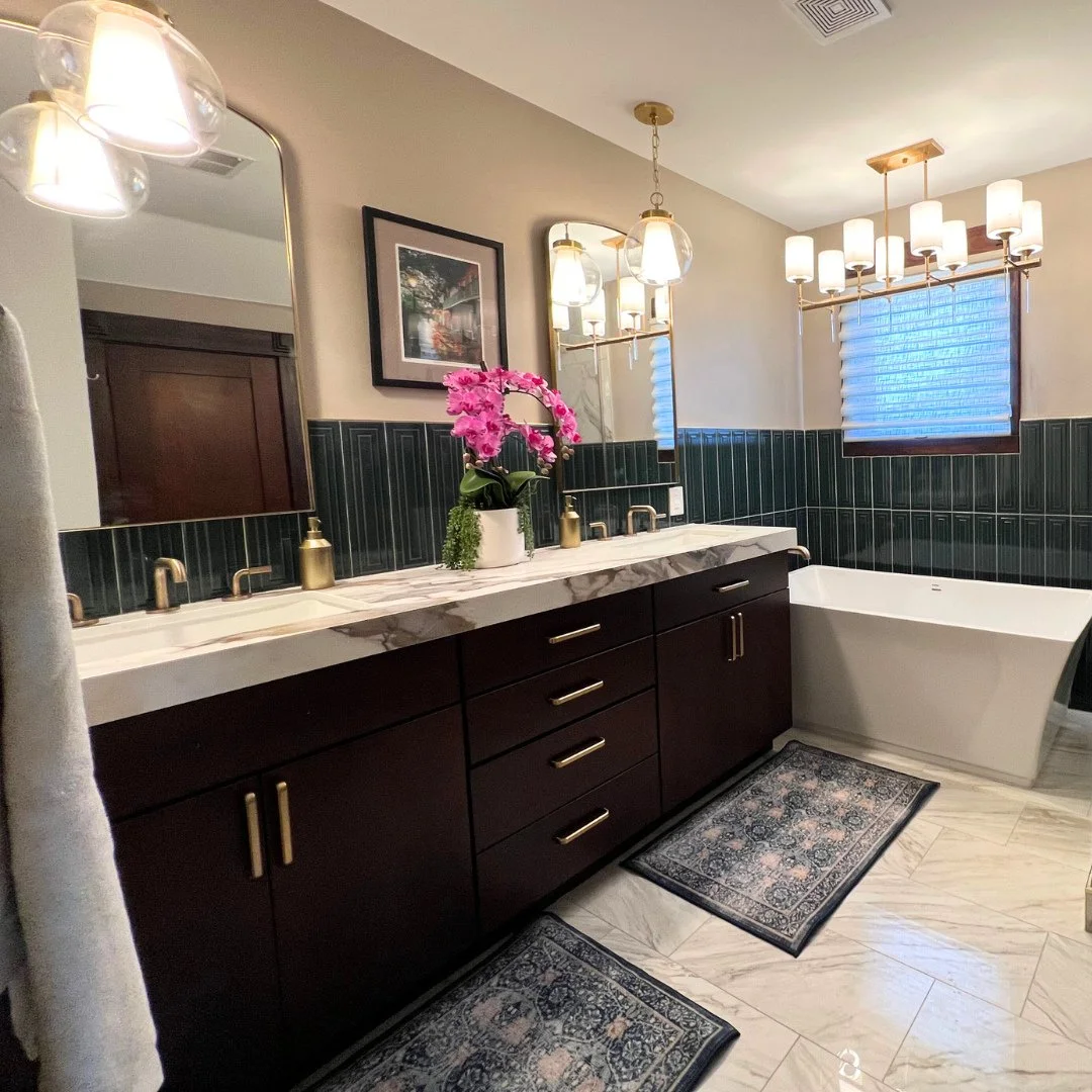 Portland Ave, reimagined. ✨⁠
For our returning clients, we transformed their historic primary bath with modern comforts&mdash;custom millwork, statement lighting, marble moments, and a spa-worthy shower&mdash;all while honoring the home&rsquo;s soul.