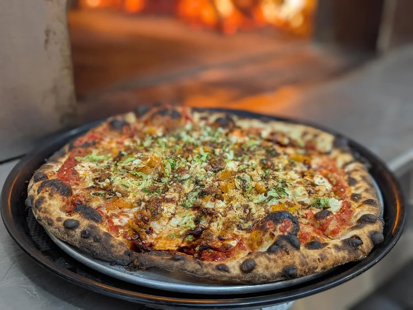 ‼️ new fall special just dropped! ‼️ : 🌙 The Harvest Moon 🌙 , a gorgeous red pizza topped with goat cheese, butternut squash, house sausage, and shaved Brussels and finished with herbed breadcrumbs and a balsamic reduction! Come check it out and ta