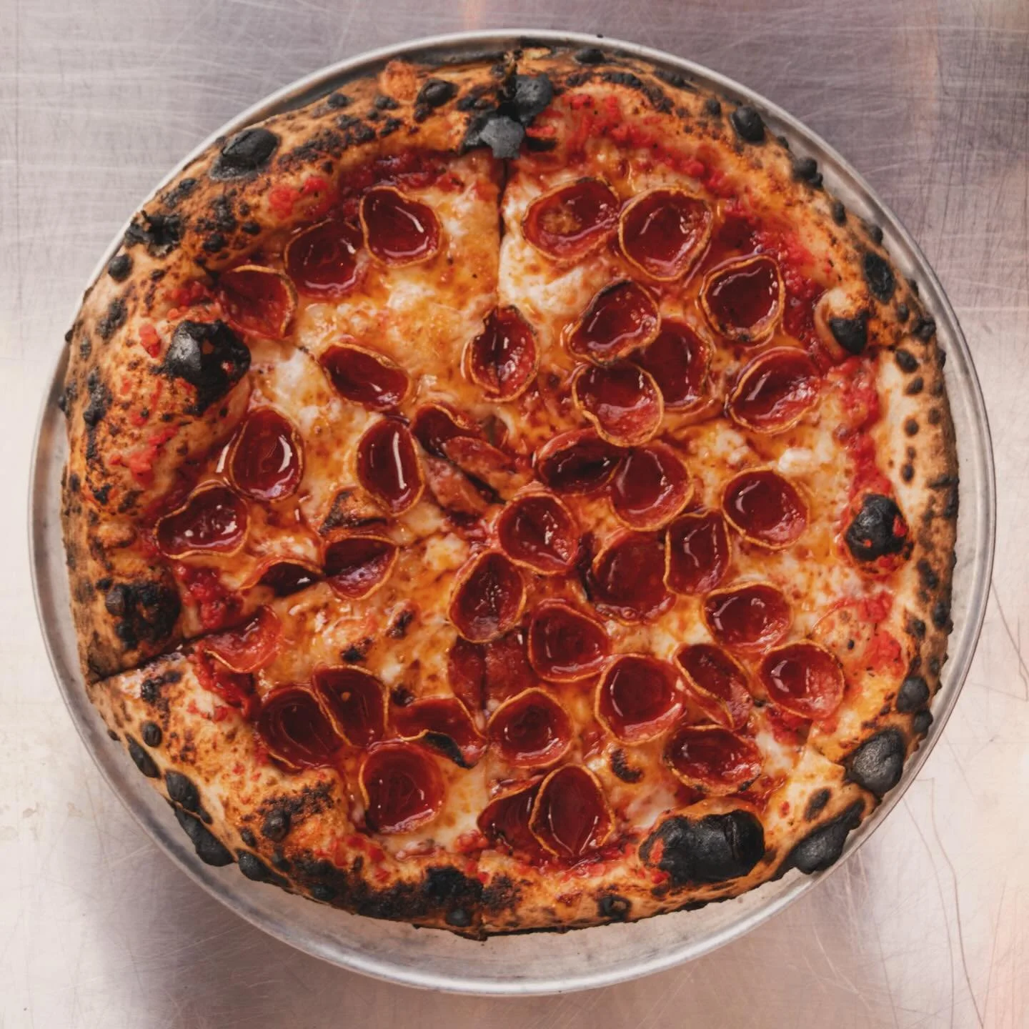 You know what goes perfectly with this frigid weather? Some tasty ~hot~ honey on our 🍕 classic pepperoni 🍕! We're out here braving the cold for you guys every day, so come on out (or don't, and order from the warmth of your couch through @doordash 